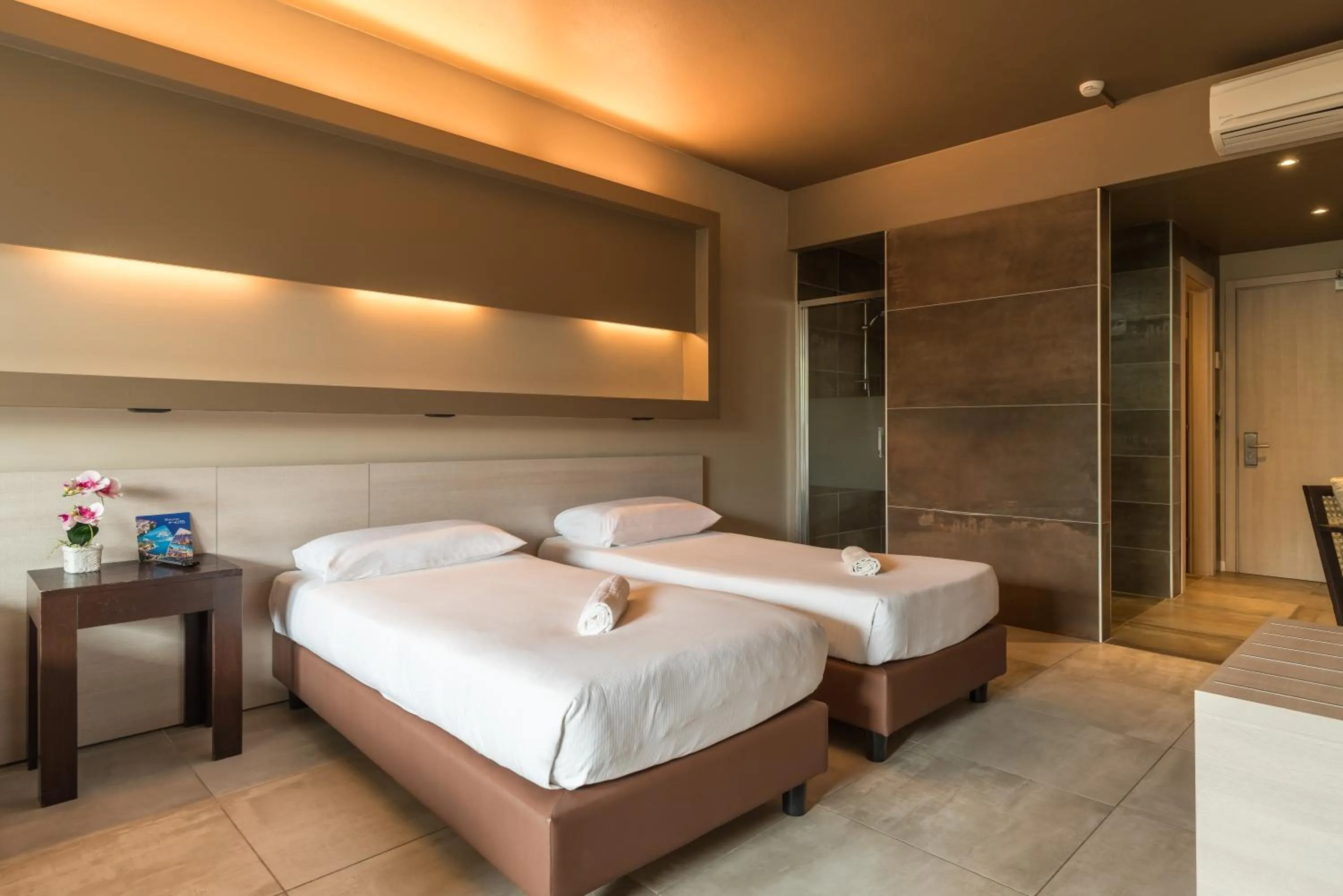 Bed in Hotel Antares Sport Beauty & Wellness