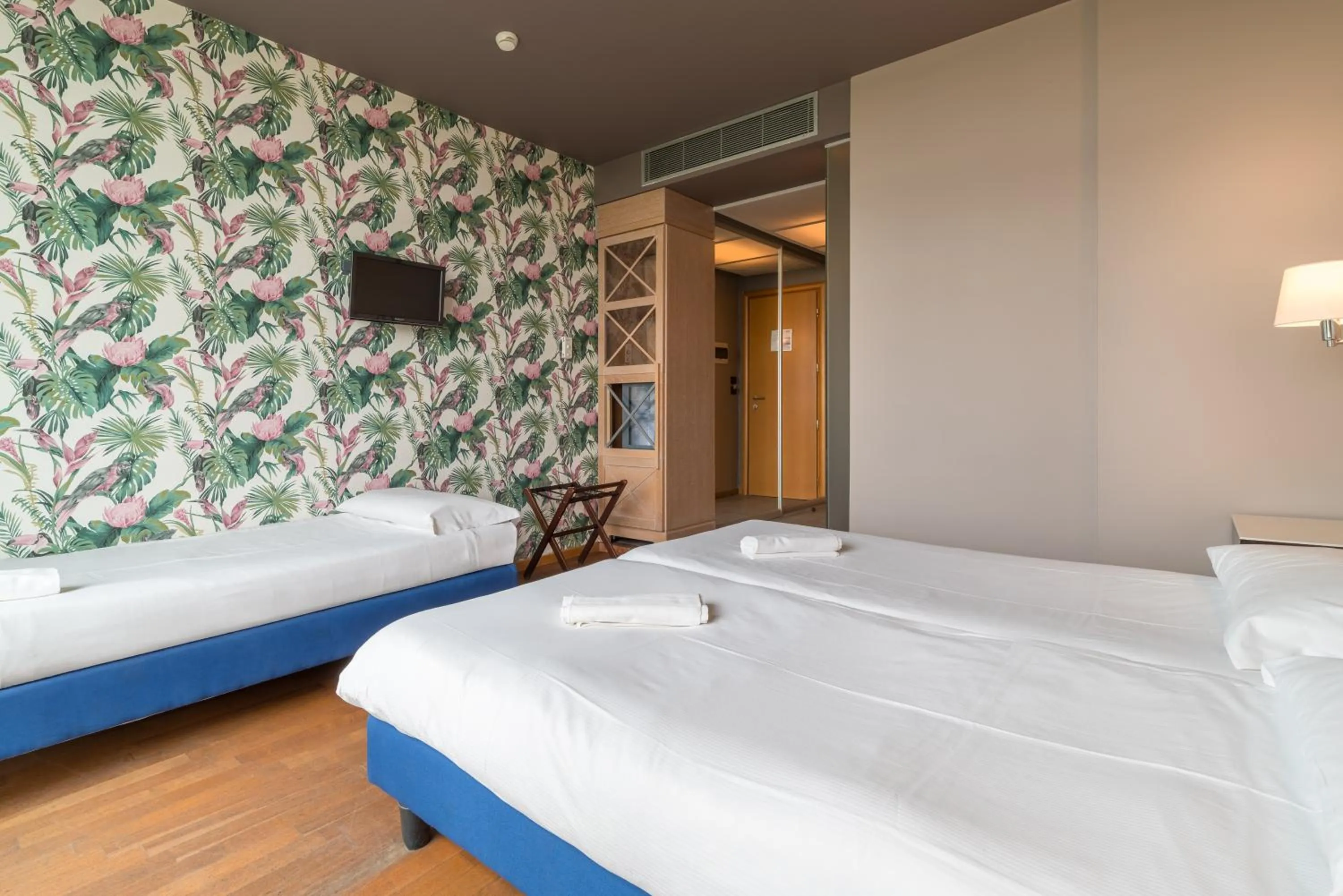 Bed in Hotel Antares Sport Beauty & Wellness