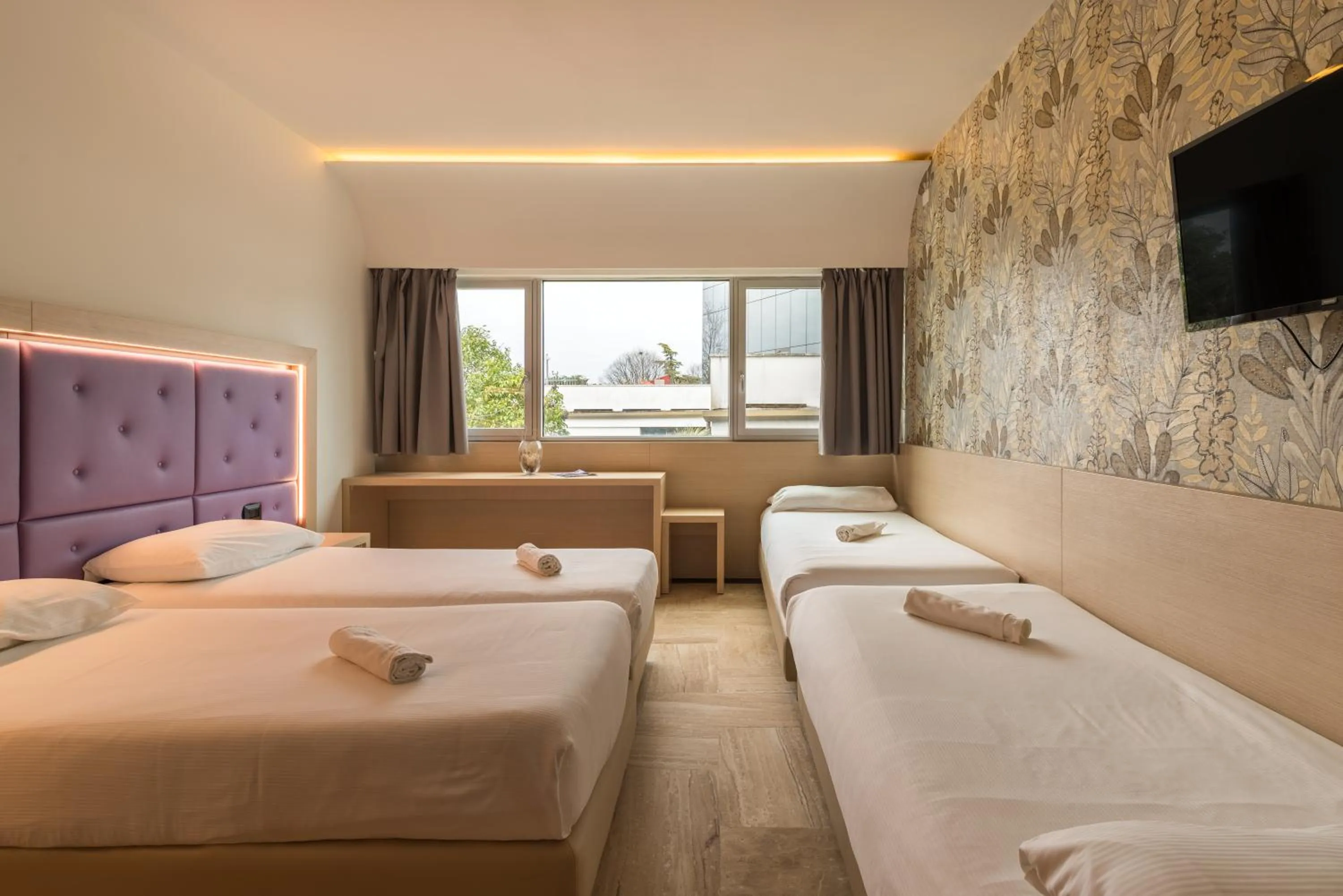 Bed in Hotel Antares Sport Beauty & Wellness