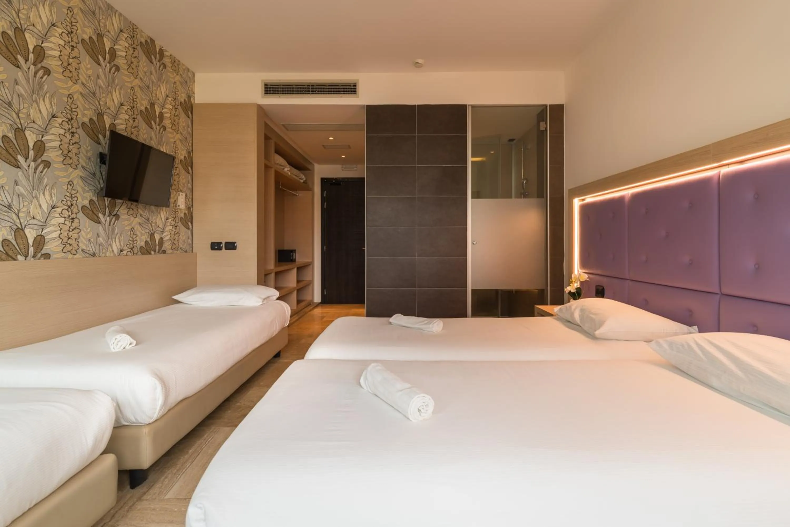 Bed in Hotel Antares Sport Beauty & Wellness