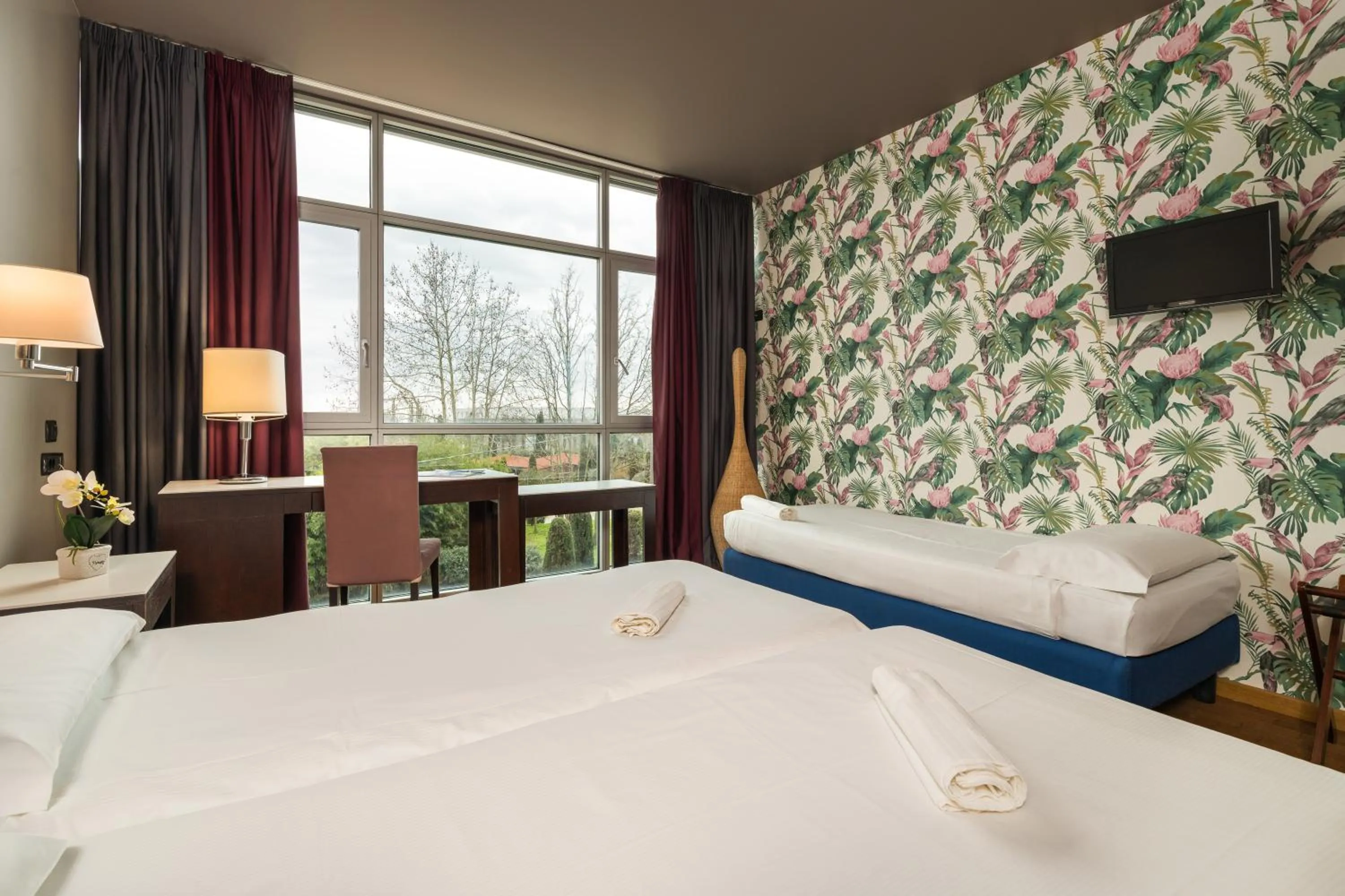 Bed in Hotel Antares Sport Beauty & Wellness