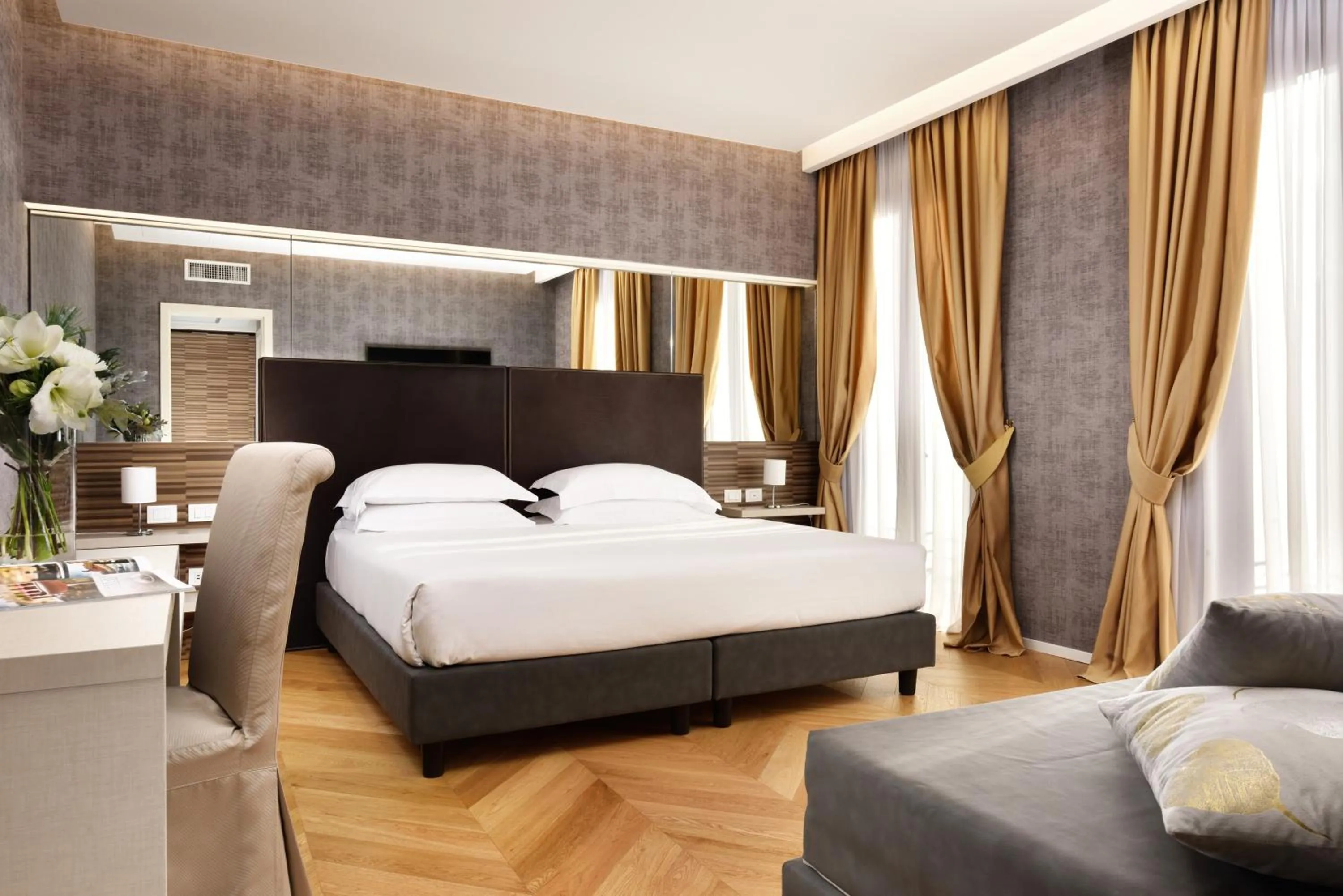 Bed in Atlante Star Hotel