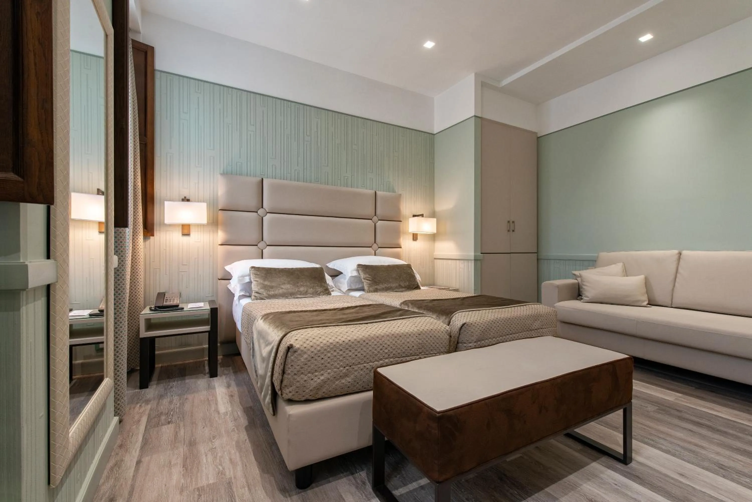 Bed in Atlante Star Hotel