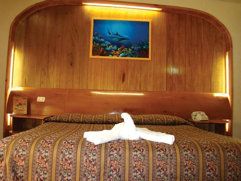 Bed in Hotel Arrecife de Coral