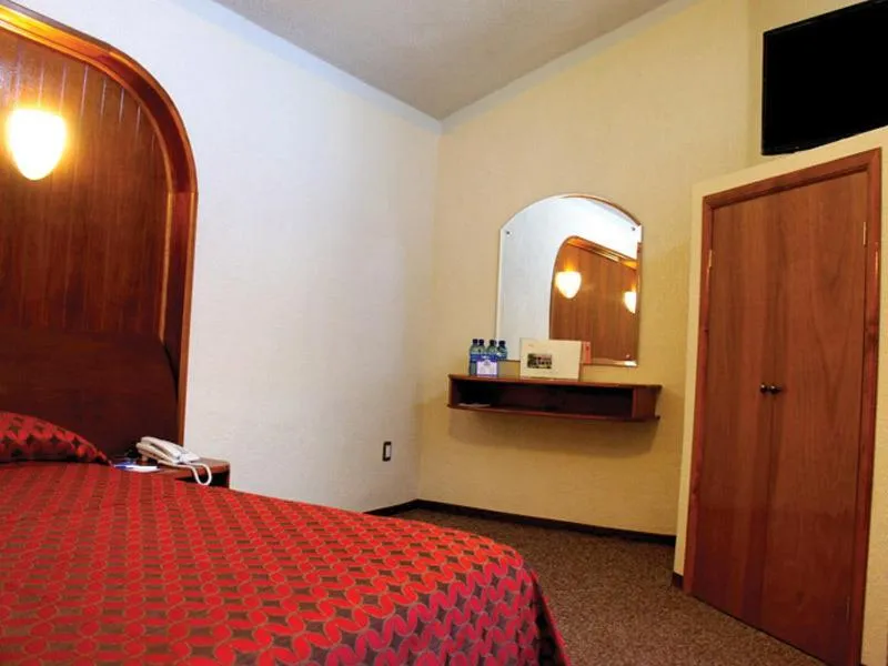 Bed in Hotel Arrecife de Coral