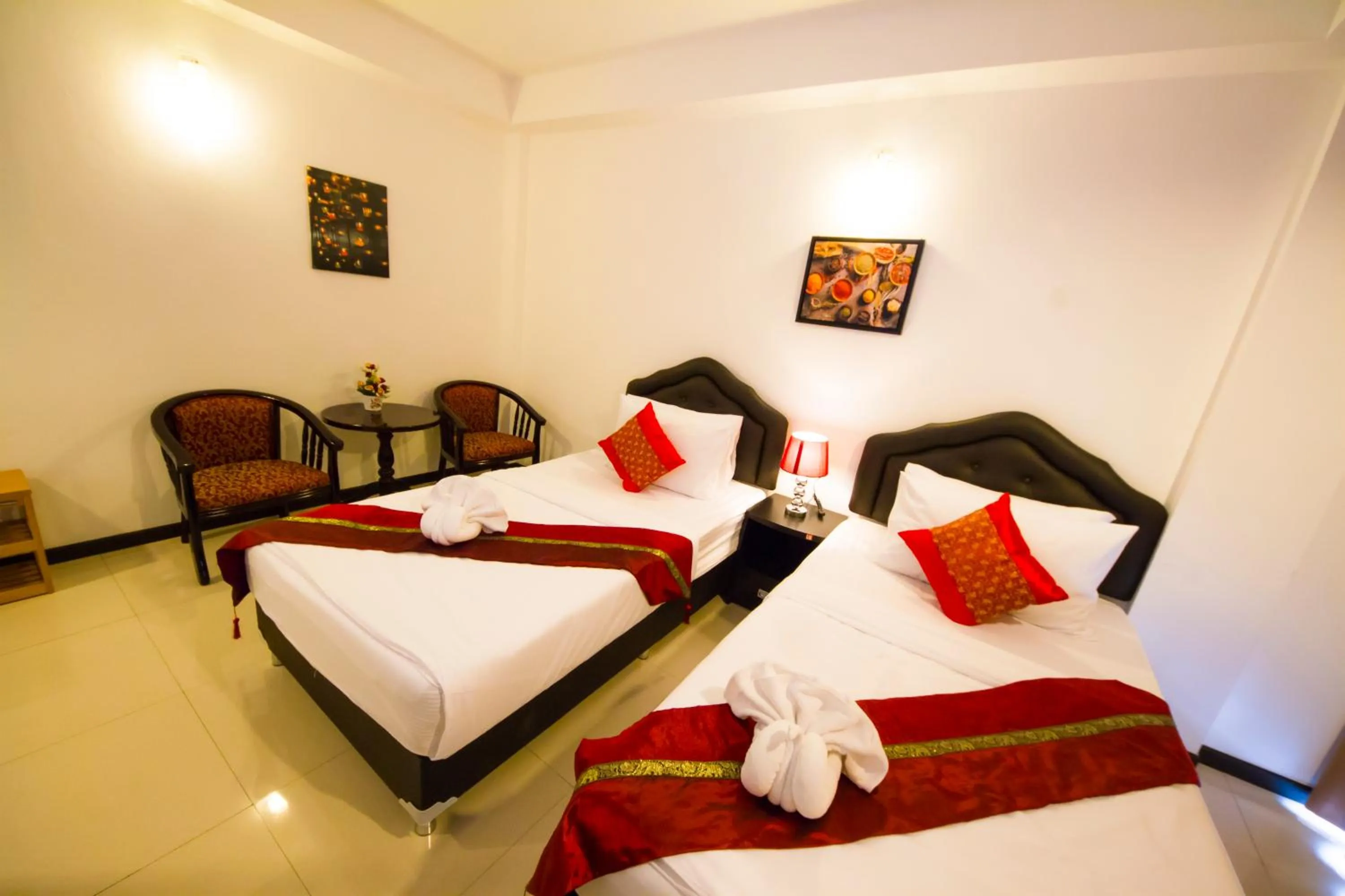 Photo of the whole room, Bed in TH beach hotel