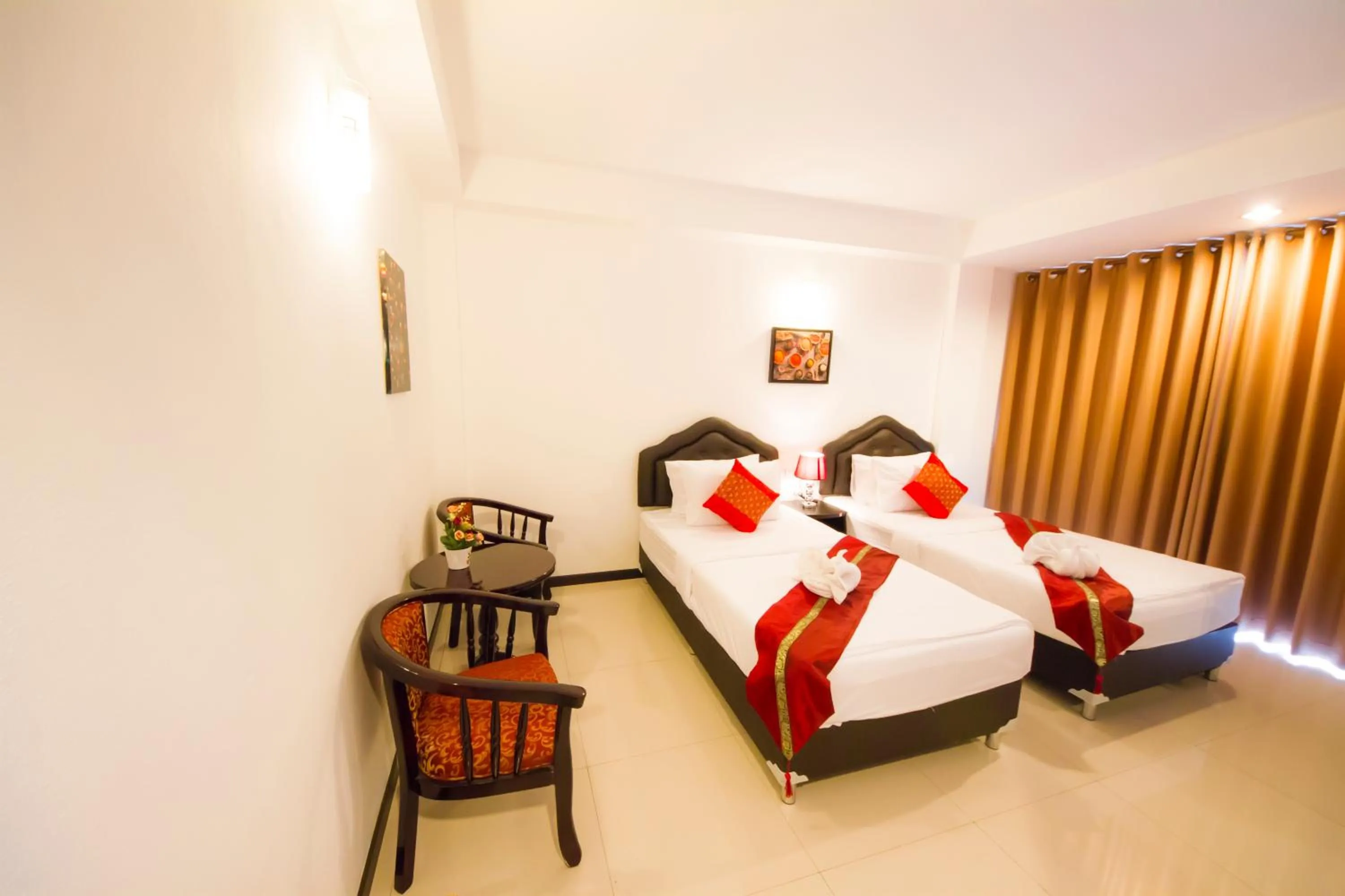 Photo of the whole room, Bed in TH beach hotel