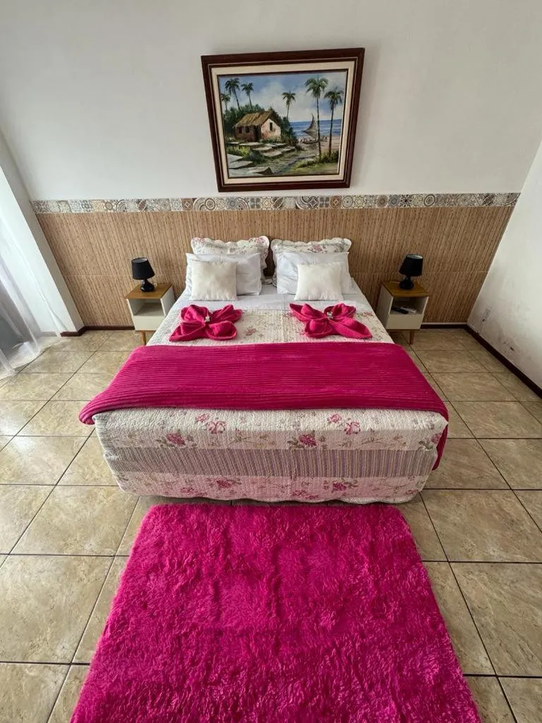 Bed in Pousada toca do cambu