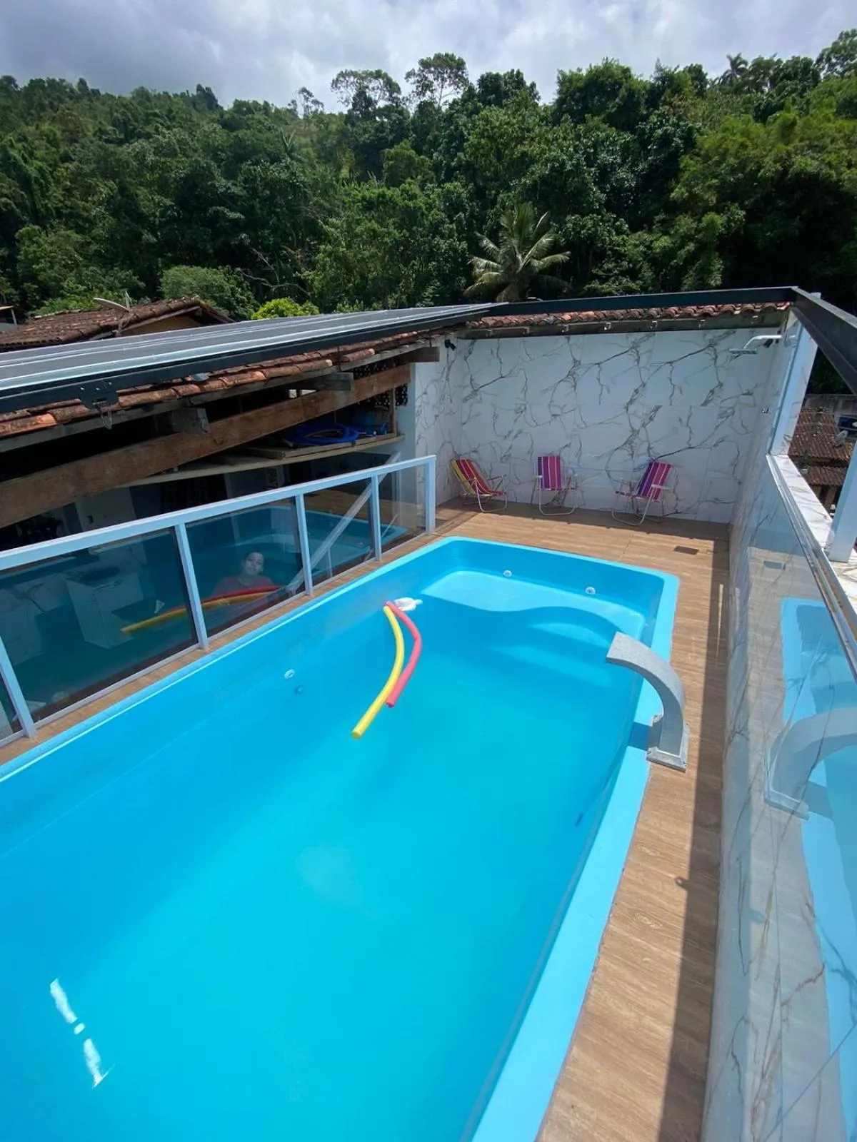 Swimming pool in Pousada toca do cambu