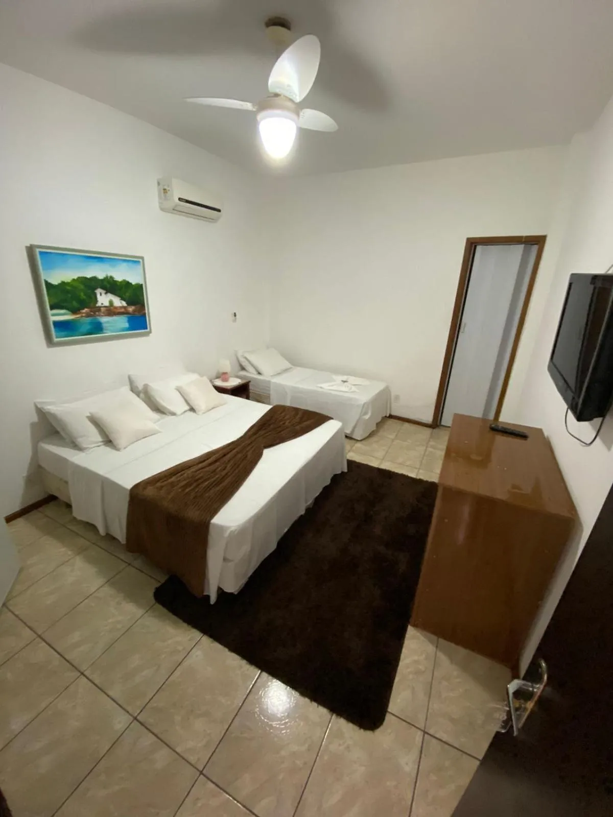 Bed in Pousada toca do cambu