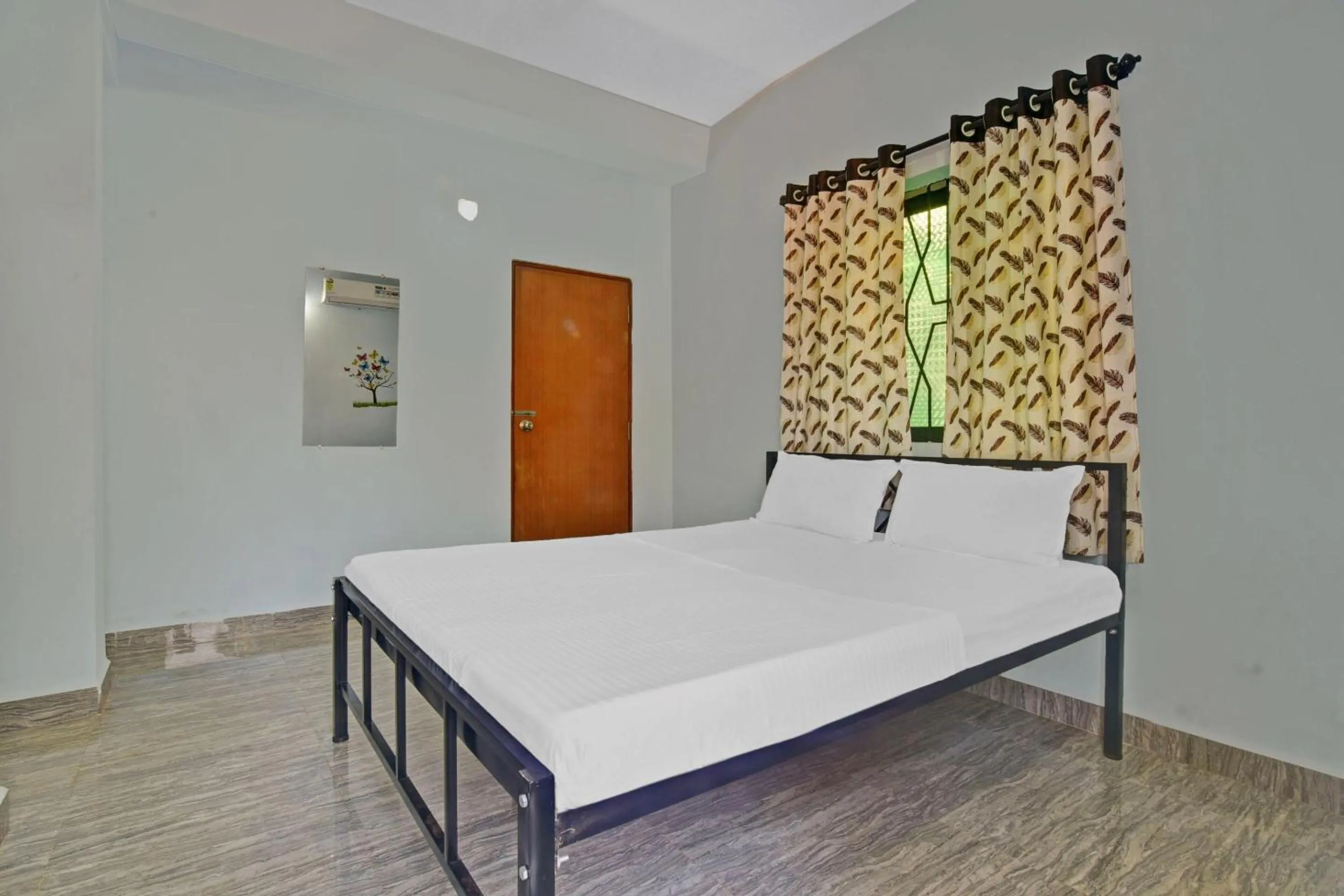 Bedroom in Hotel O by OYO Sai Leela