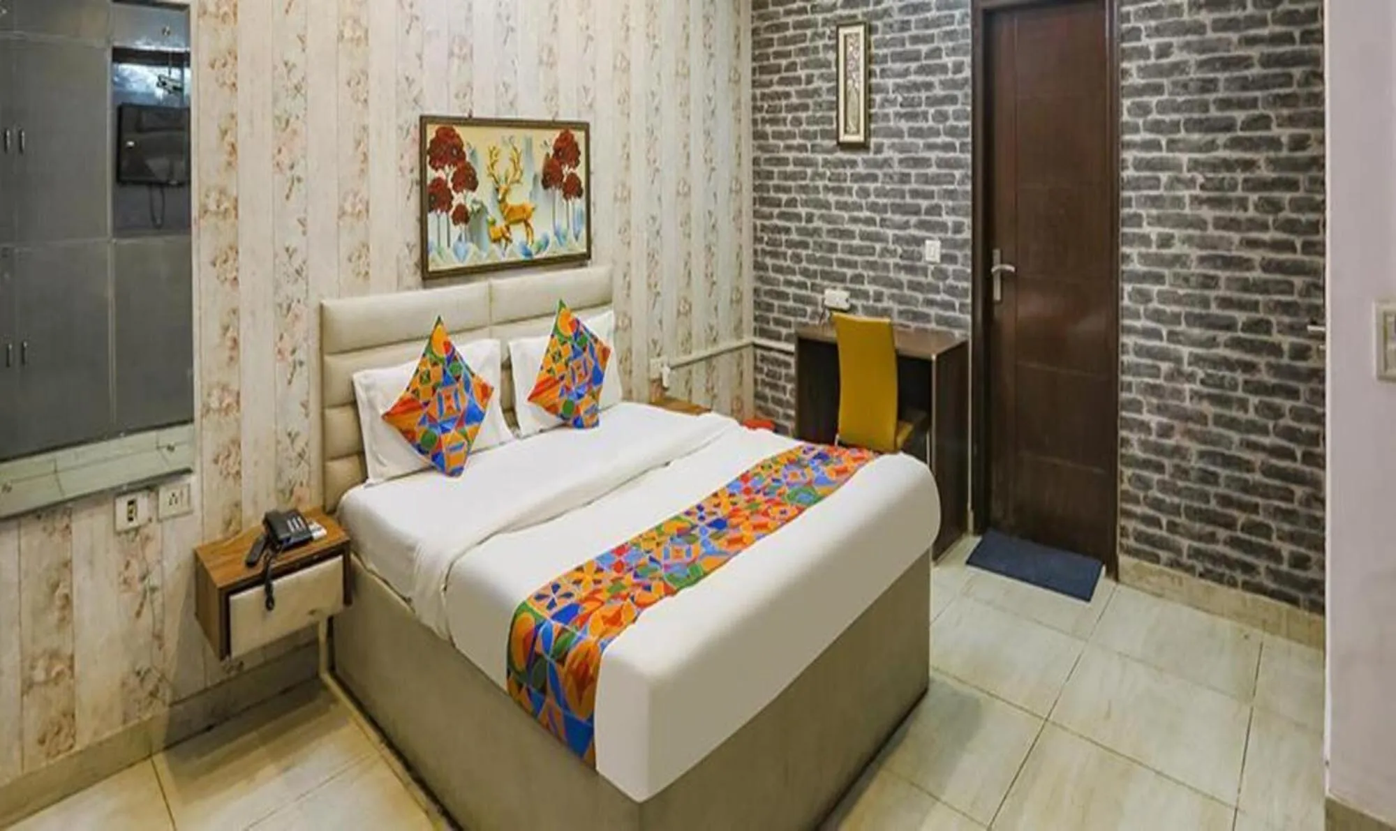 Bed in FabHotel Comfirt Inn