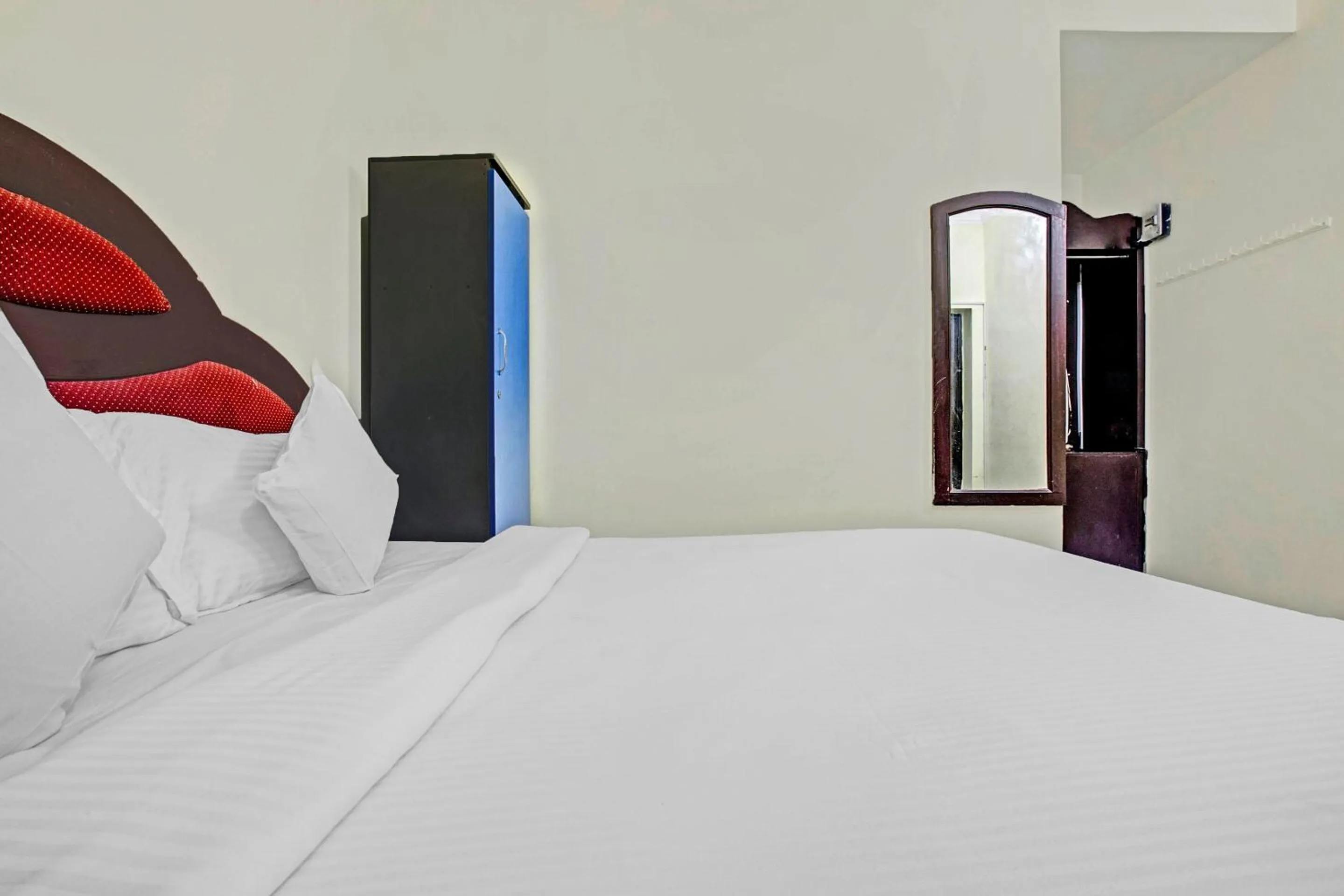 Bedroom in Hotel O Neethu Residency