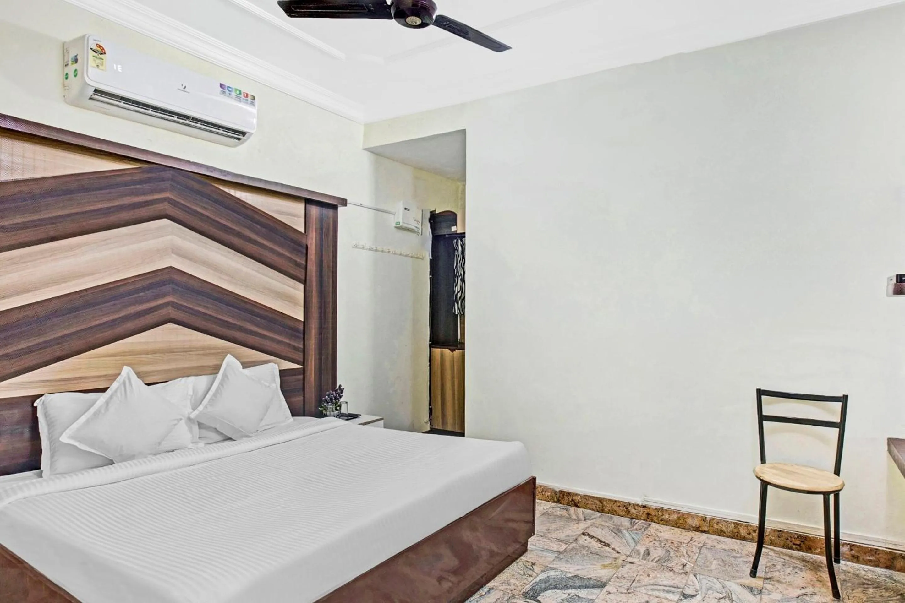 Bedroom in Hotel O Neethu Residency