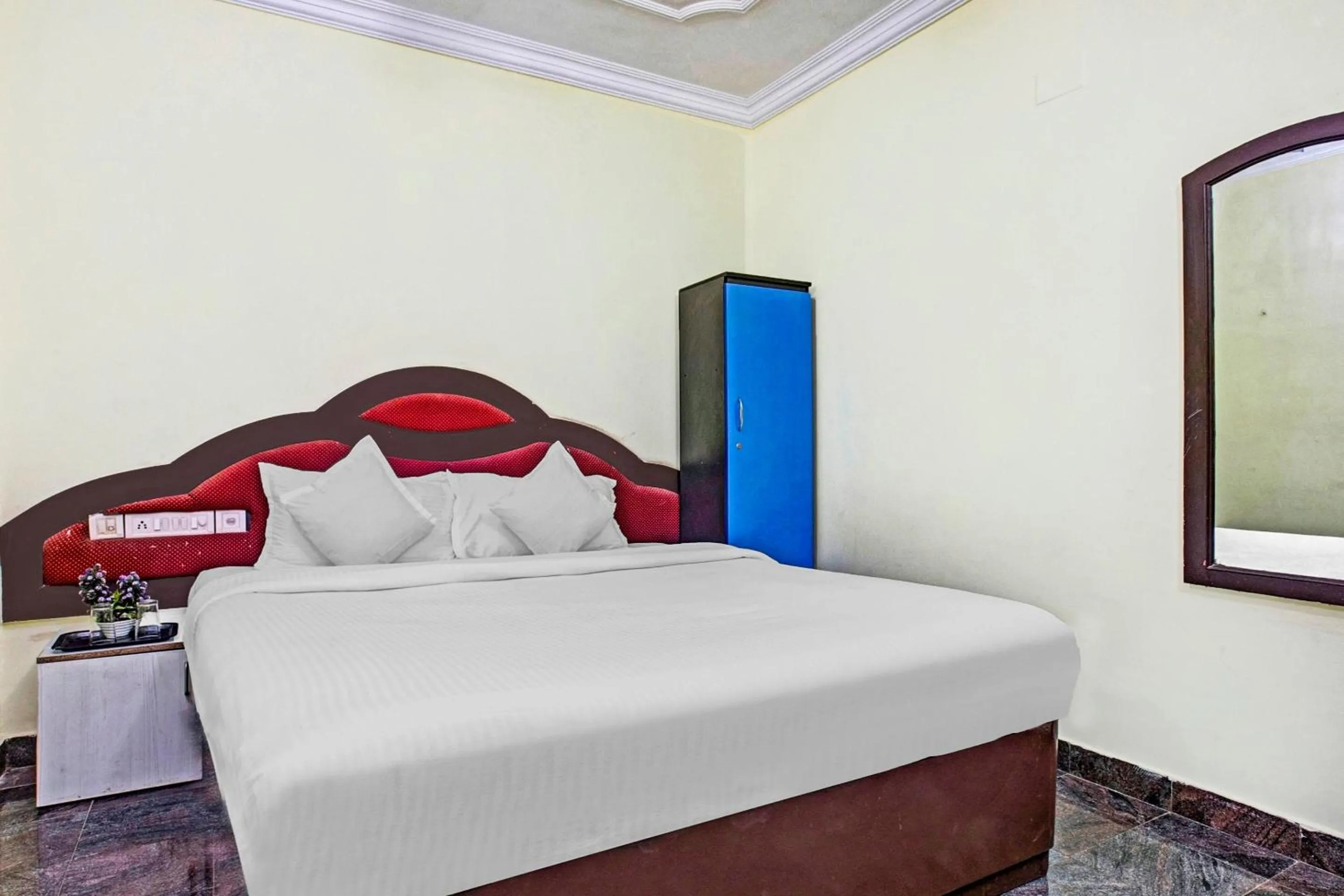 Bedroom in Hotel O Neethu Residency