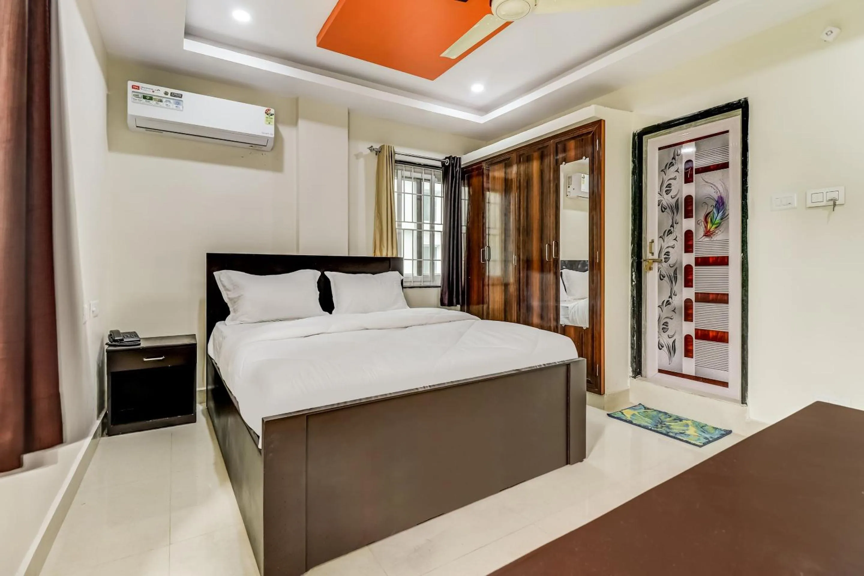 Bedroom in Hotel O Sri Singampalli Residency