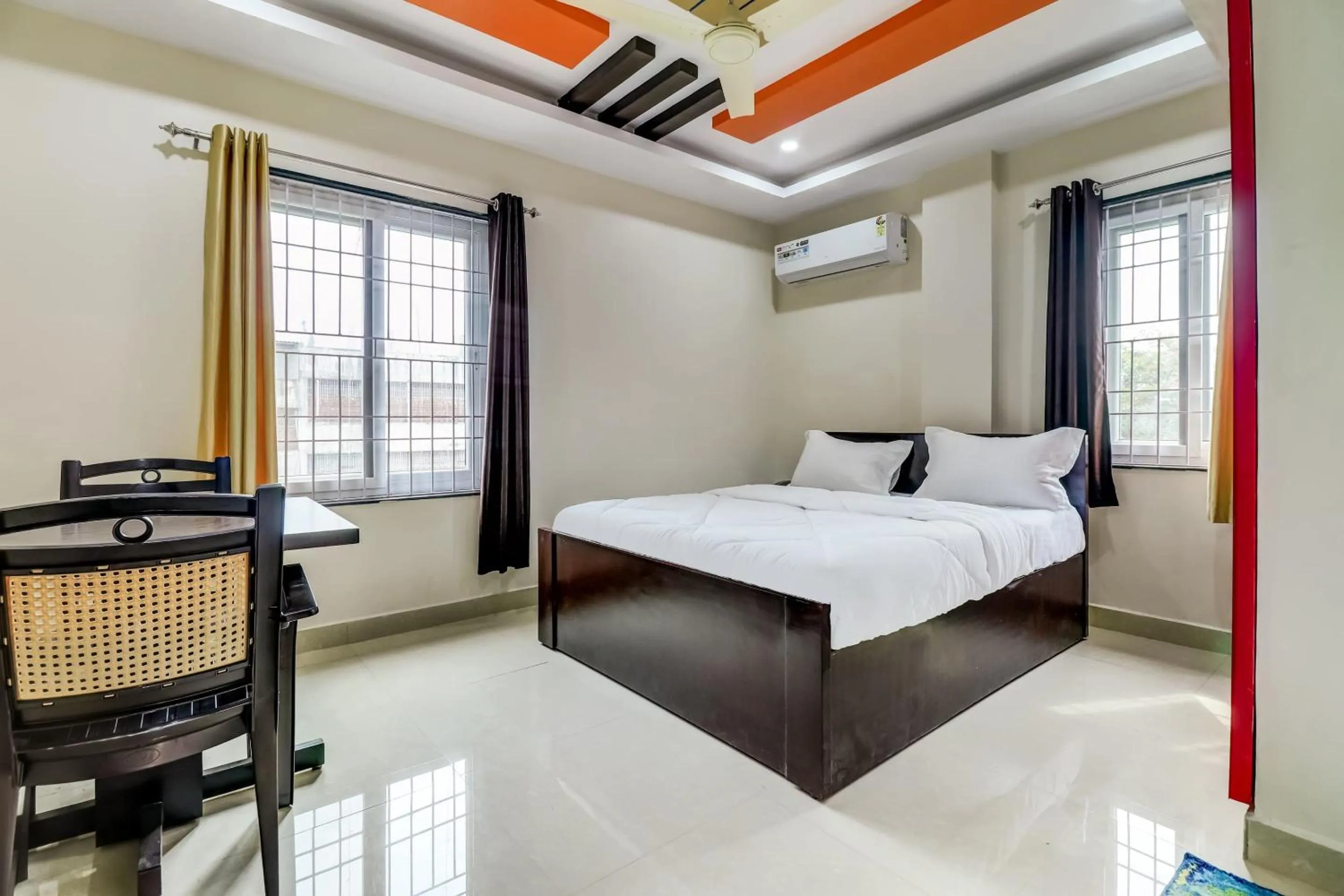 Bedroom in Hotel O Sri Singampalli Residency