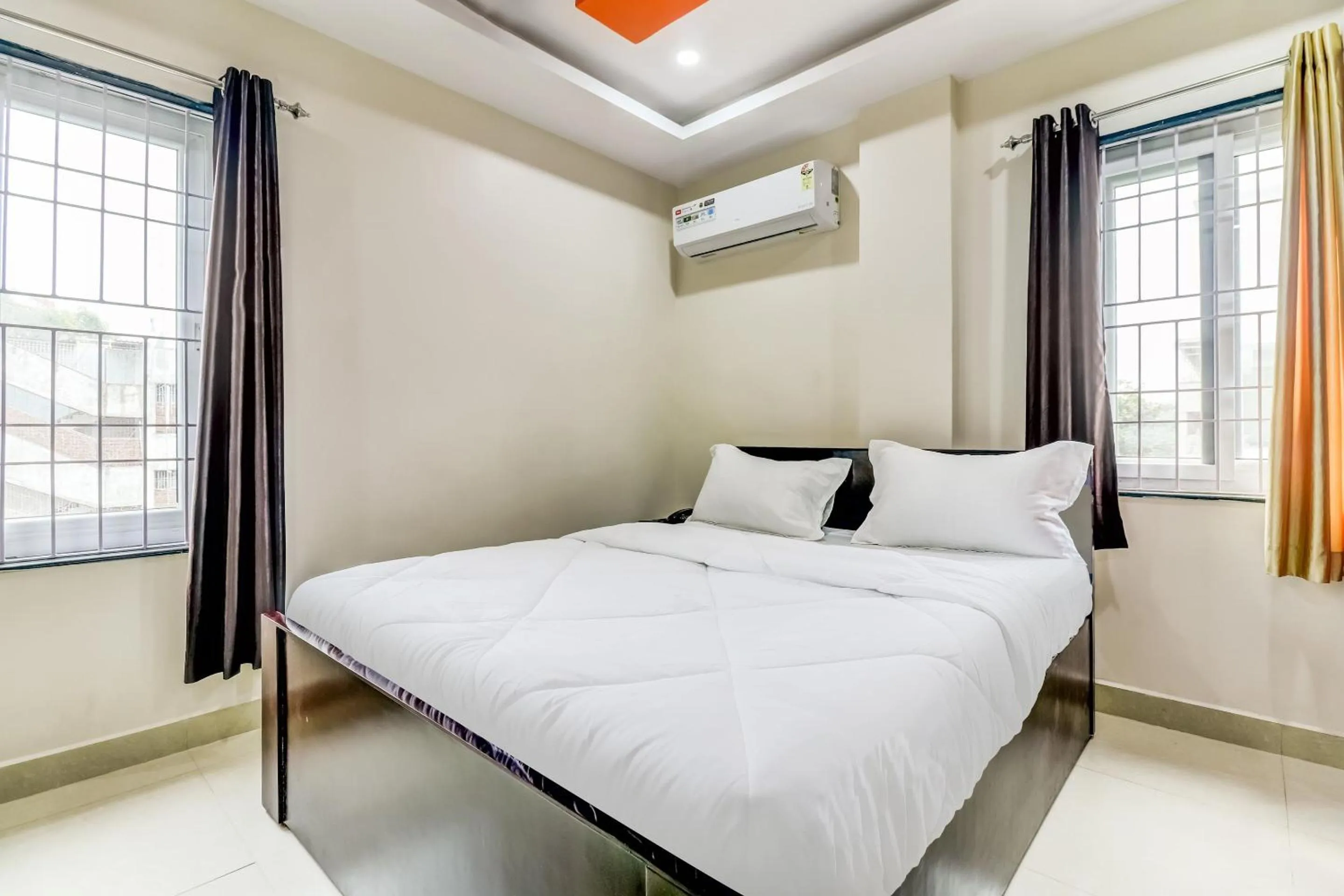 Bedroom in Hotel O Sri Singampalli Residency