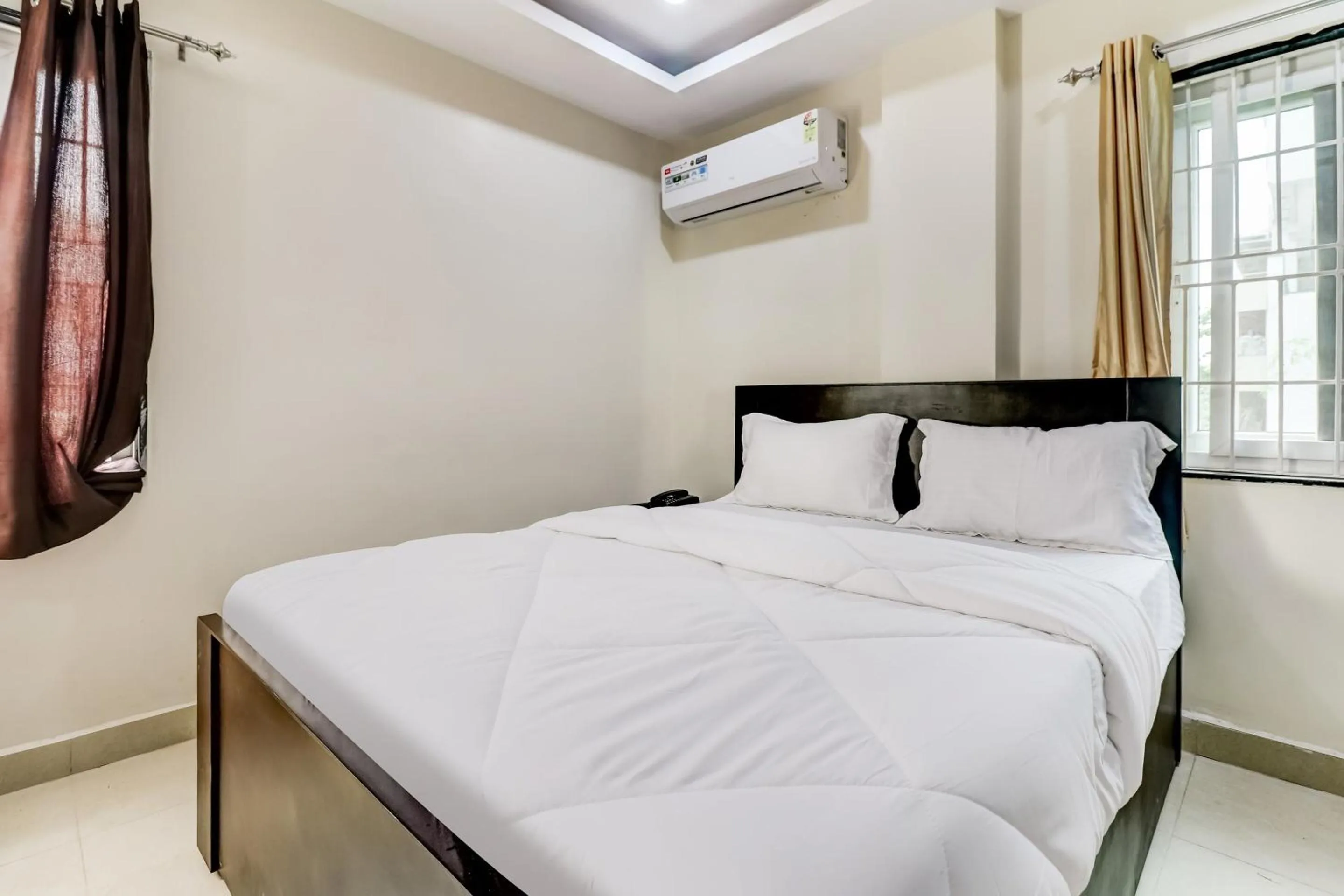 Bedroom in Hotel O Sri Singampalli Residency