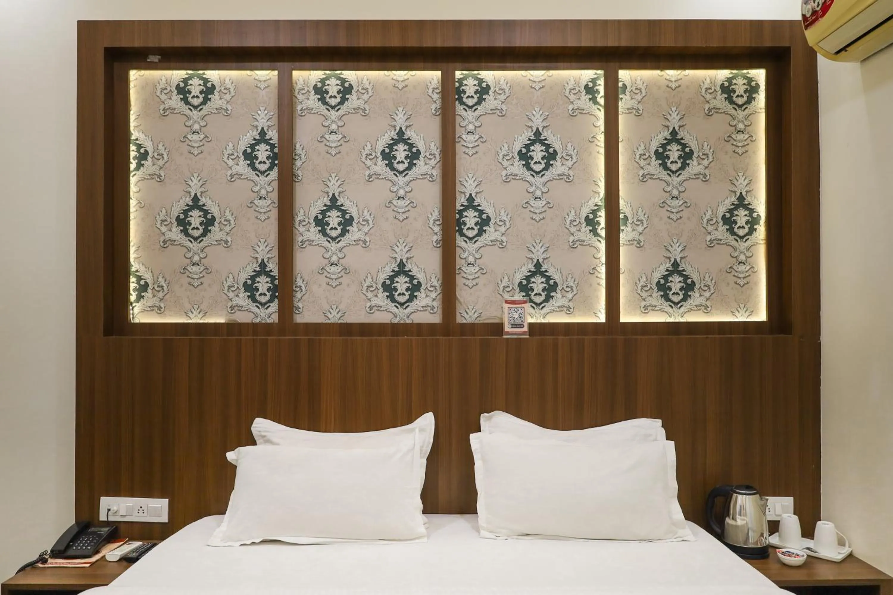 Bed in HOTEL CITY PALACE