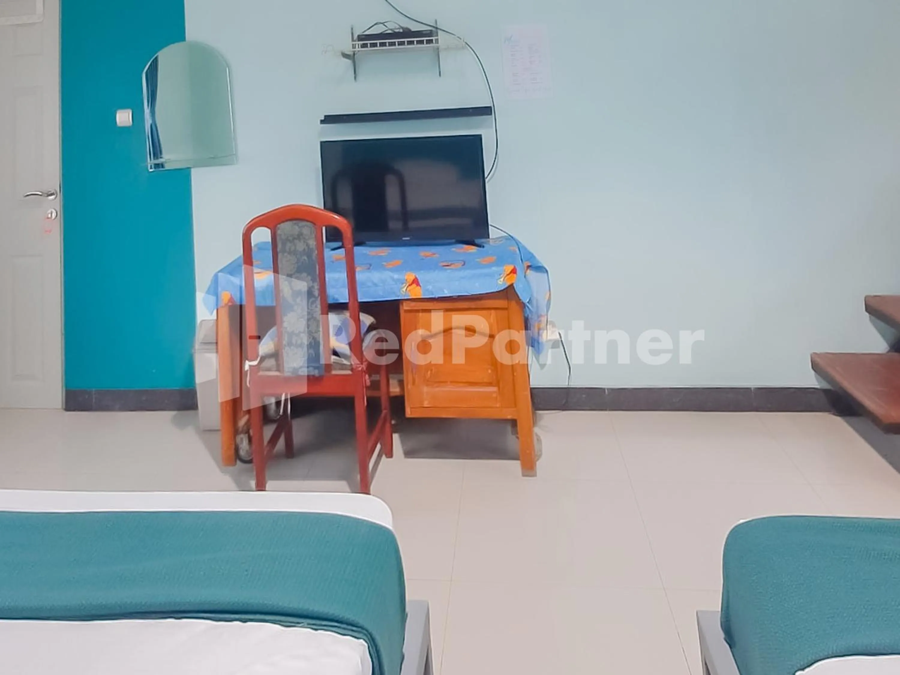 Bed in Syariah Safar Guest House Mitra RedDoorz