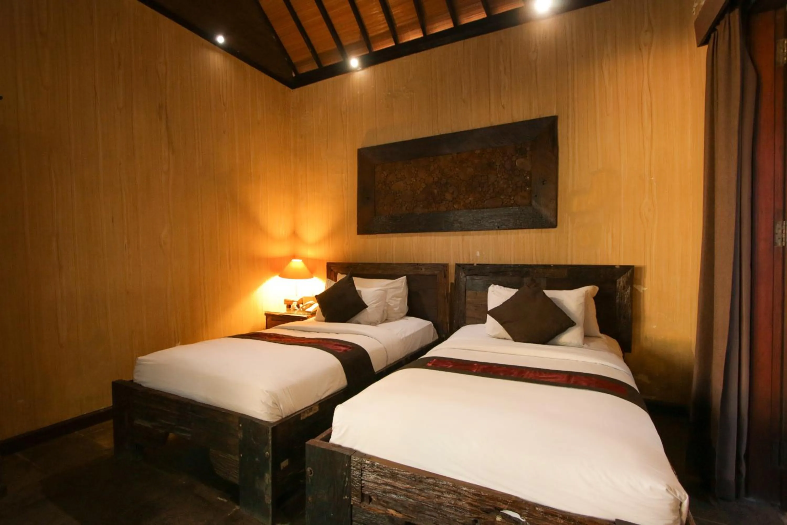 Bed in Gino Feruci Villa Ubud by KAGUM Hotels