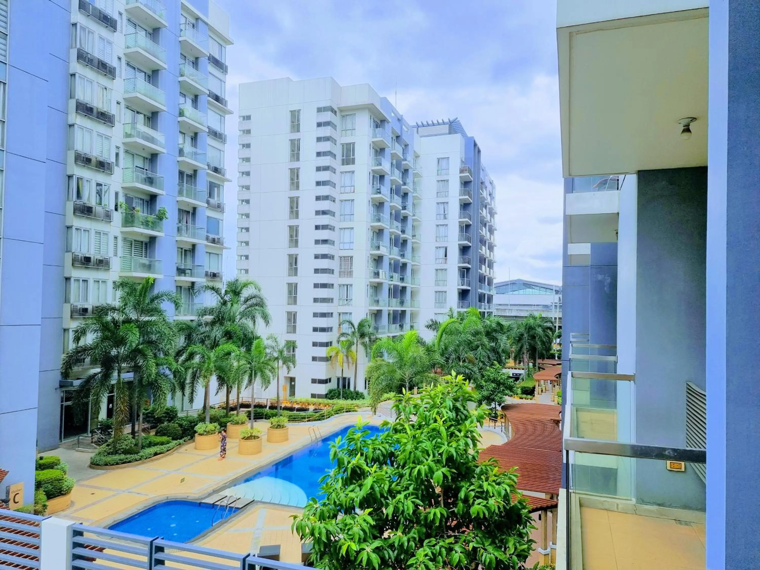 Pool view in One Palm Tree Villas Condo Across NAIA Terminal 3