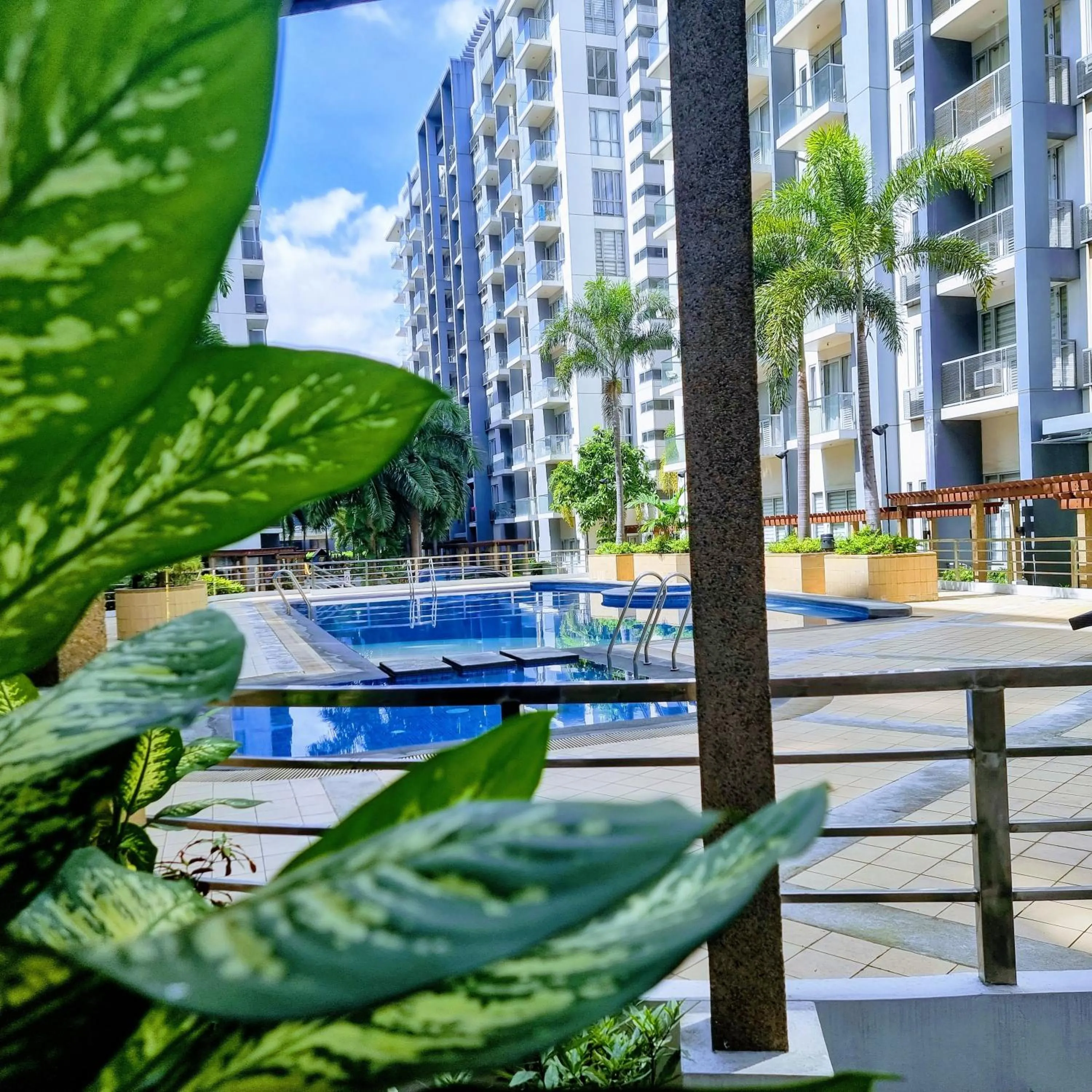 Swimming pool in One Palm Tree Villas Condo Across NAIA Terminal 3