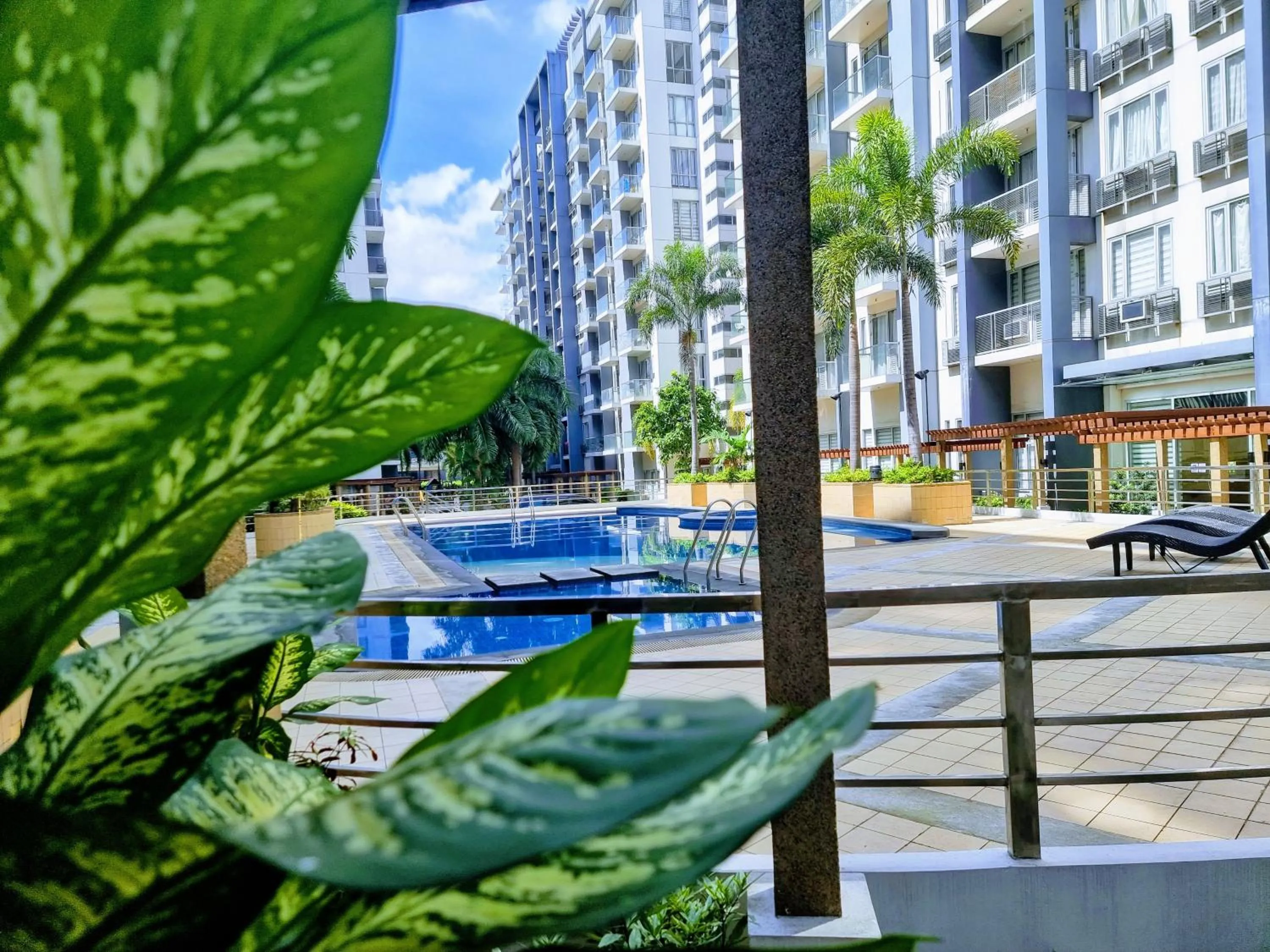 Swimming pool in One Palm Tree Villas Condo Across NAIA Terminal 3