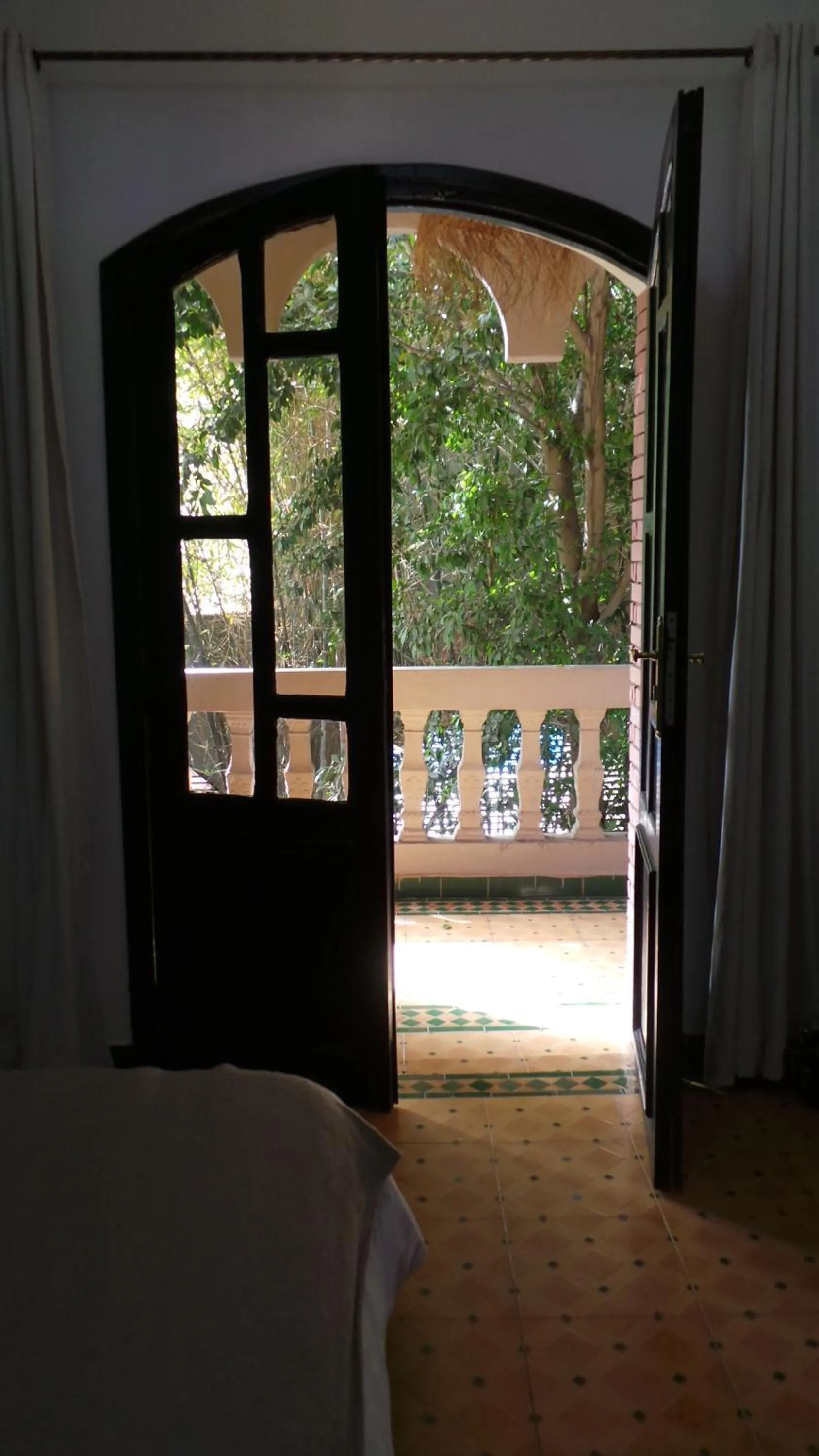 Balcony/Terrace, Bed in Targafit Hotel & Hammam