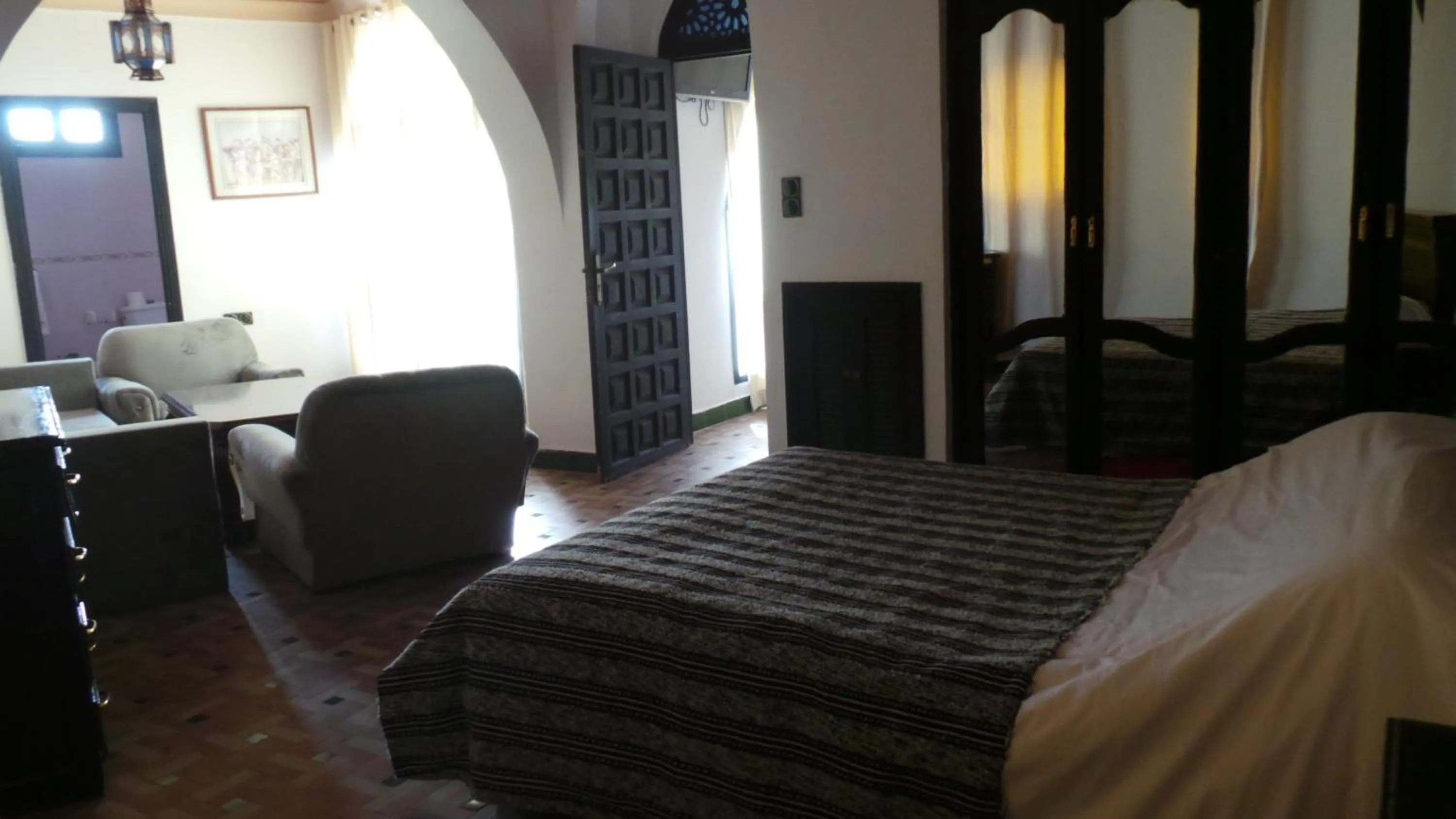 Photo of the whole room, Bed in Targafit Hotel & Hammam
