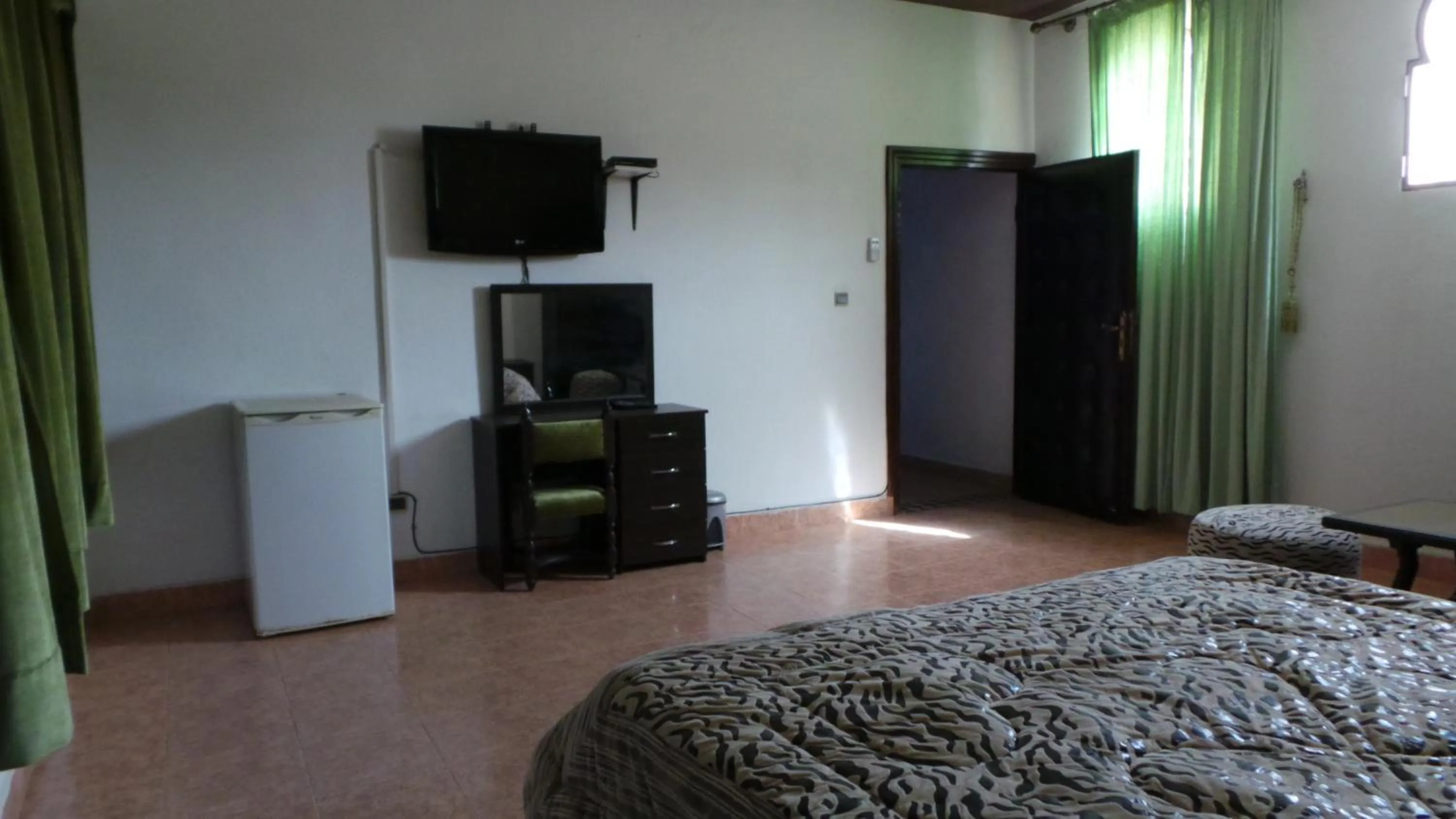 Photo of the whole room, Bed in Targafit Hotel & Hammam