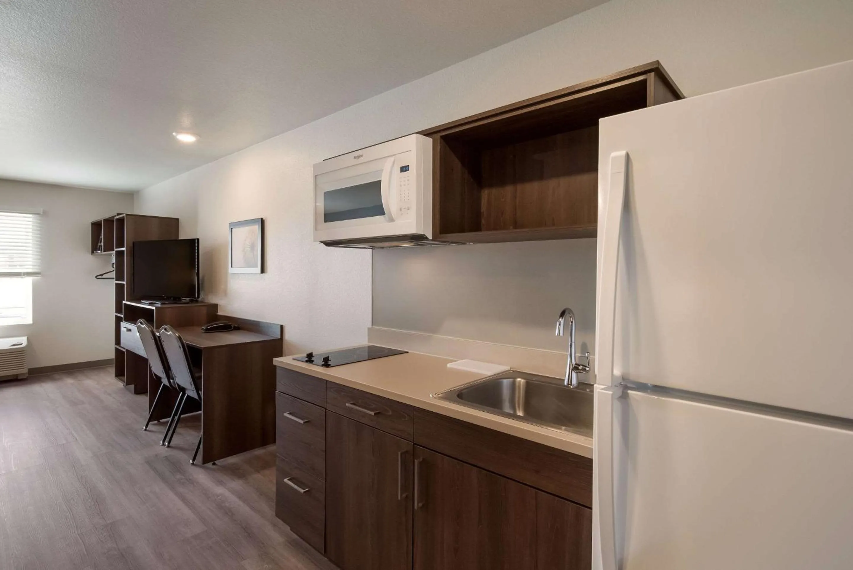 Bedroom in WoodSpring Suites Colorado Springs North - Air Force Academy