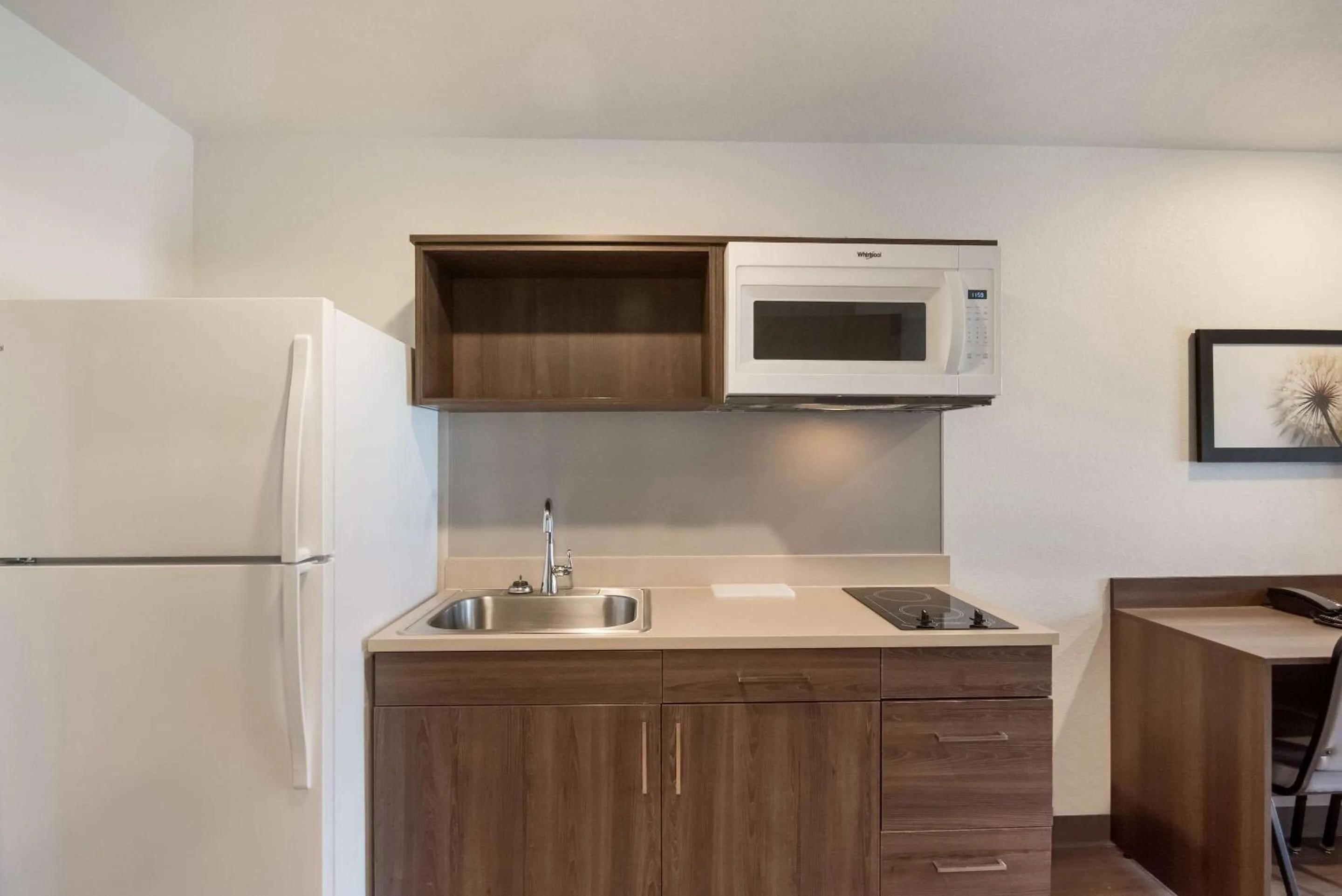 Bedroom in WoodSpring Suites Colorado Springs North - Air Force Academy