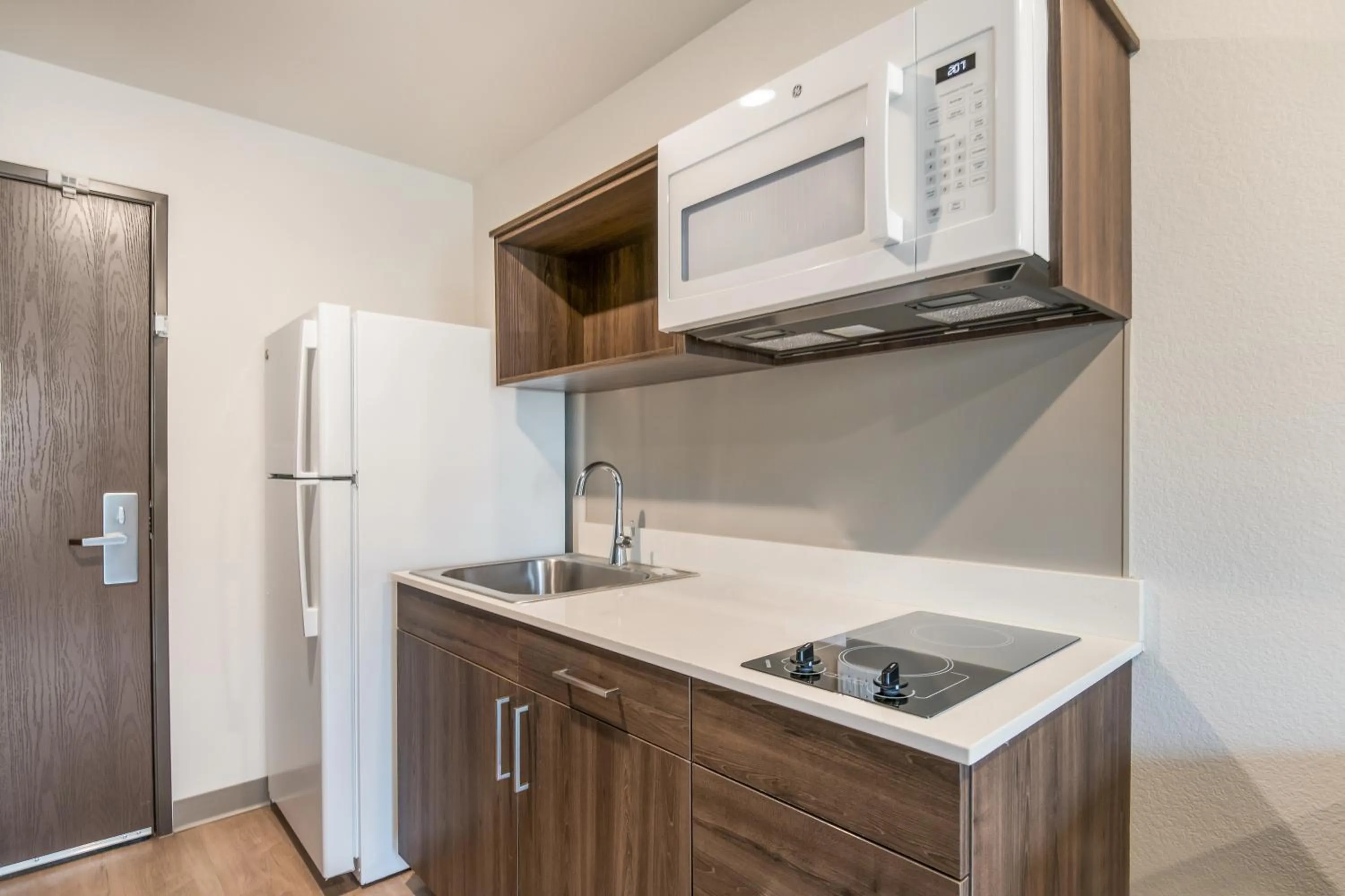 Kitchen or kitchenette in WoodSpring Suites Colorado Springs North - Air Force Academy