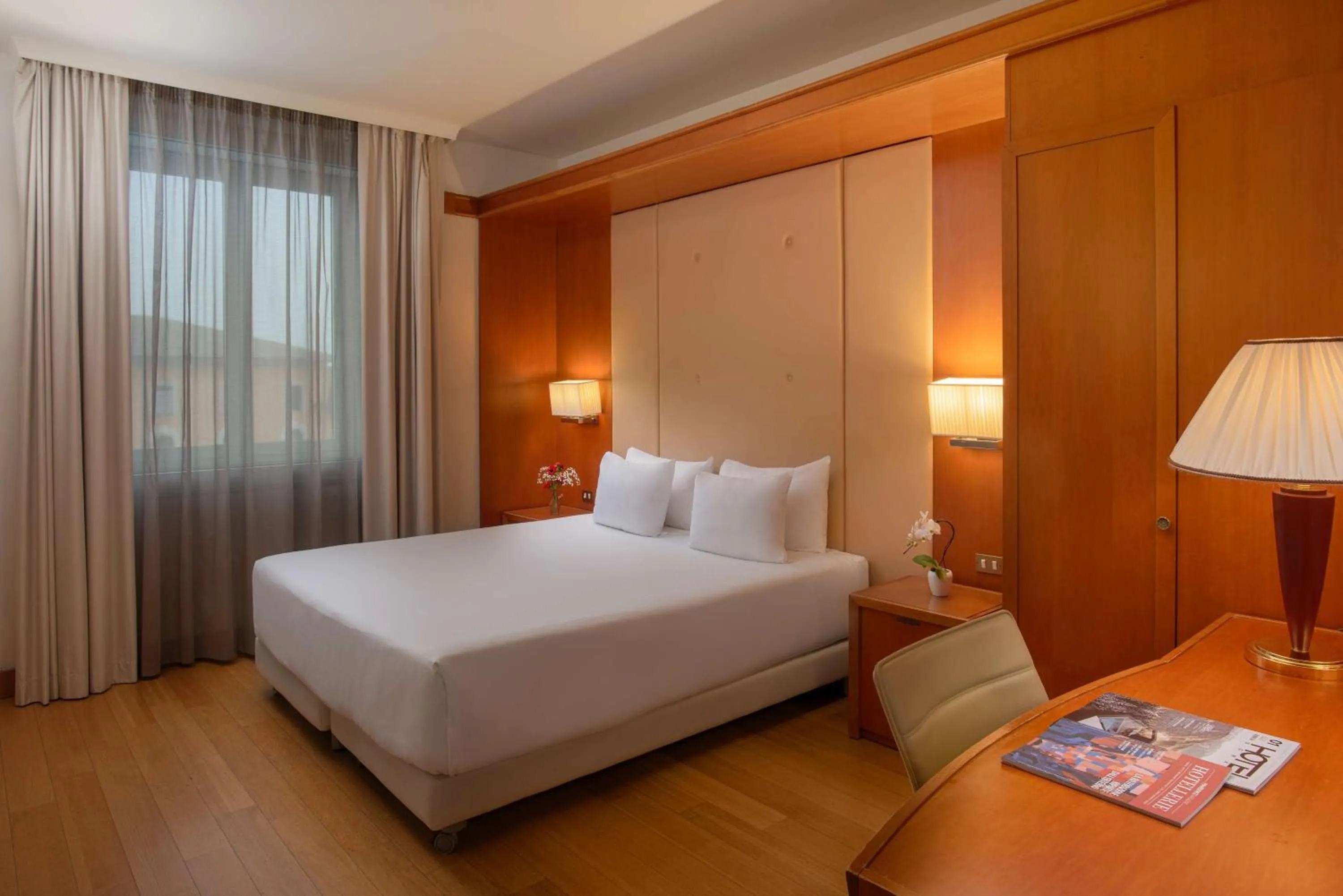 Family Adjoining Room (4 Adults) in NH Pisa