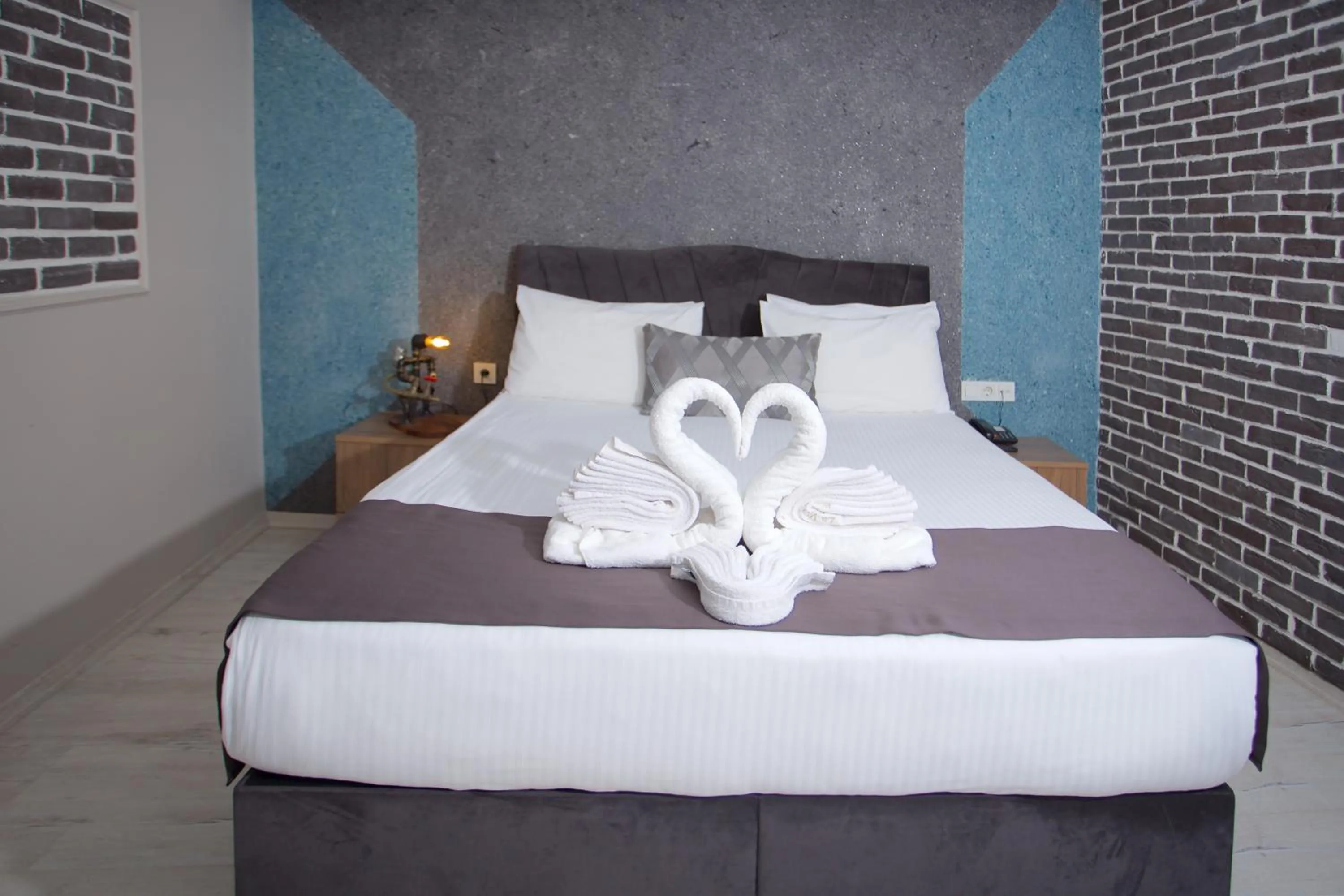 Bed in La Vida Old City Hotel