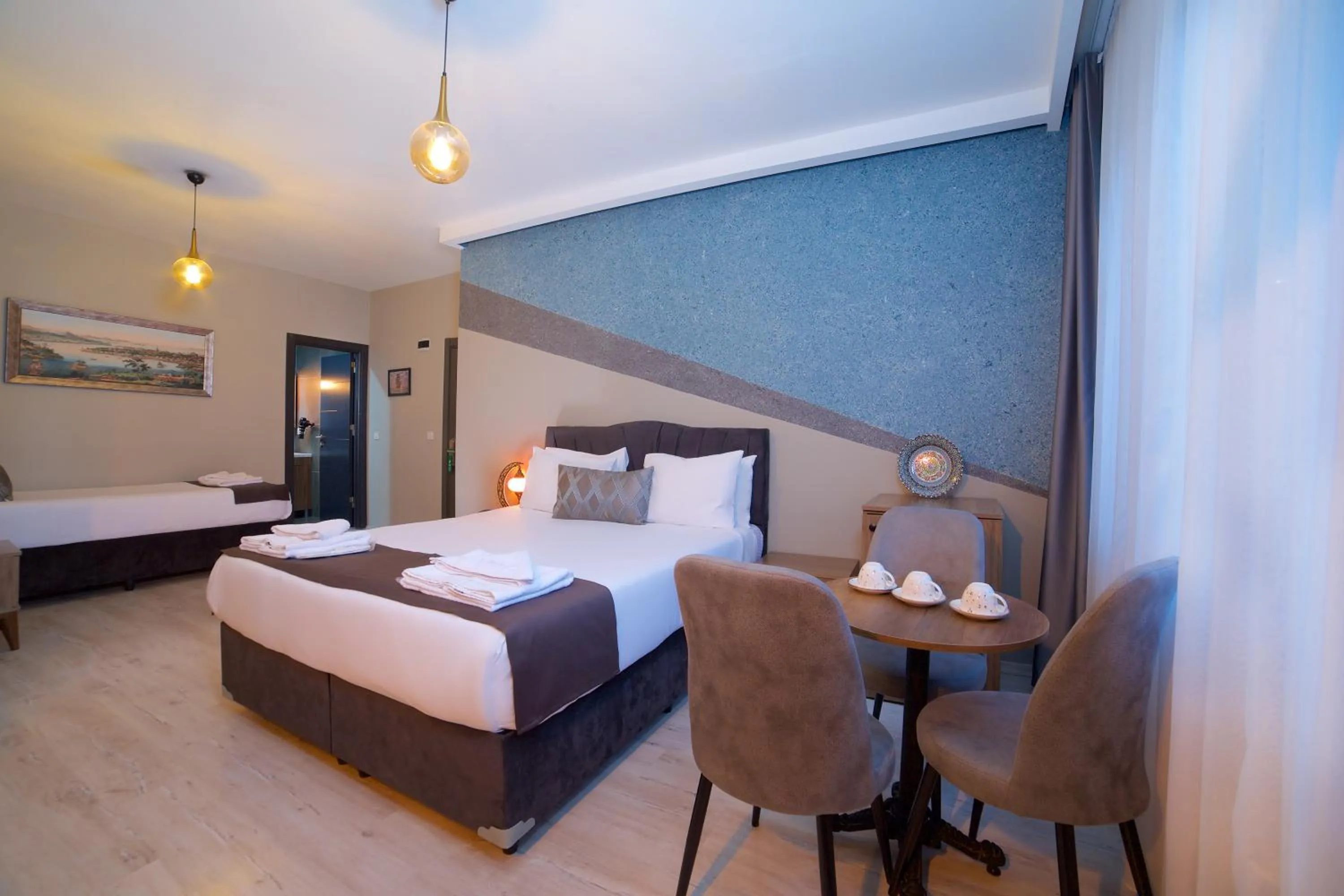 Bed in La Vida Old City Hotel