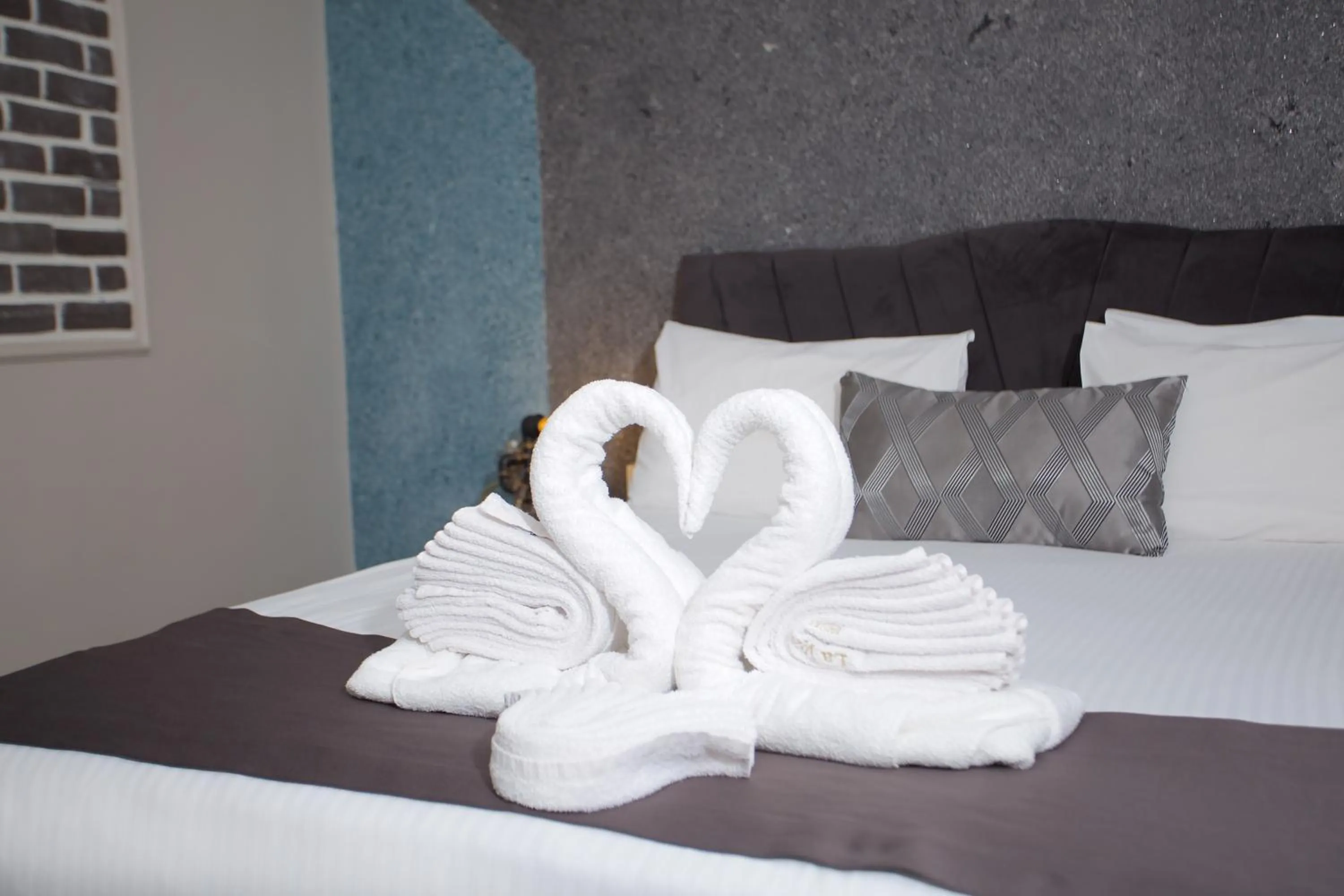 Bed in La Vida Old City Hotel