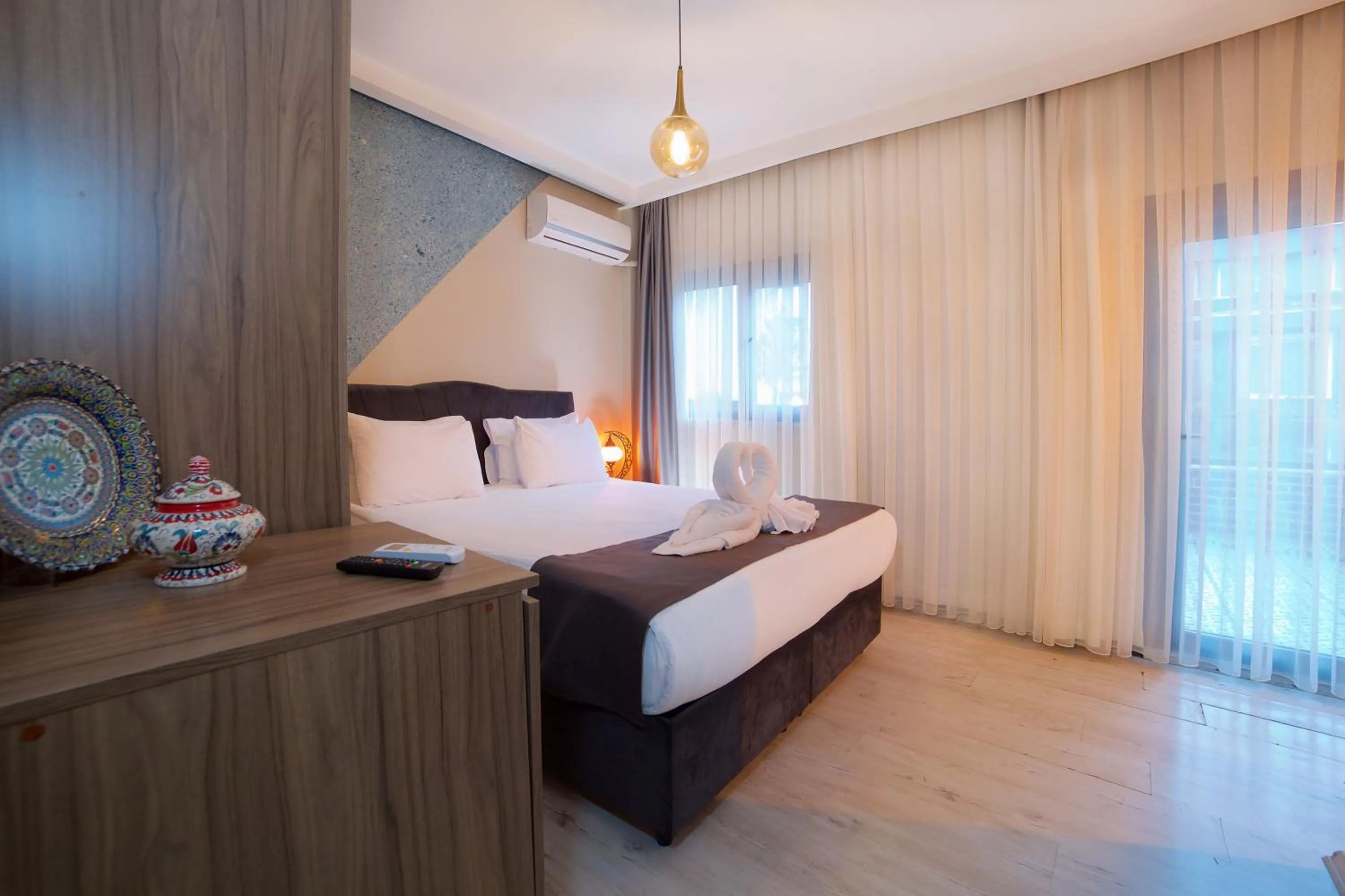 Bed in La Vida Old City Hotel