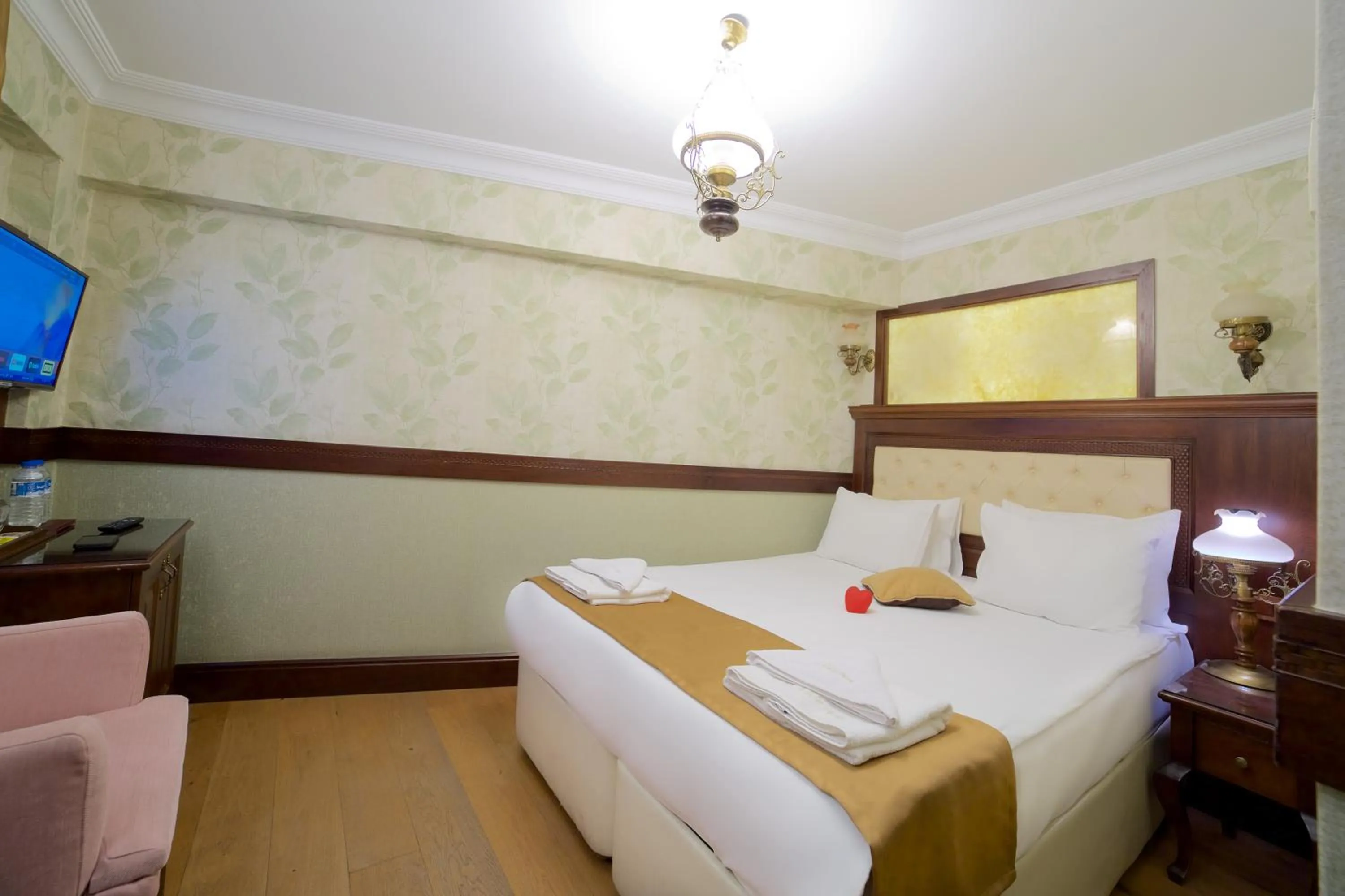 Bed in La Vida Old City Hotel