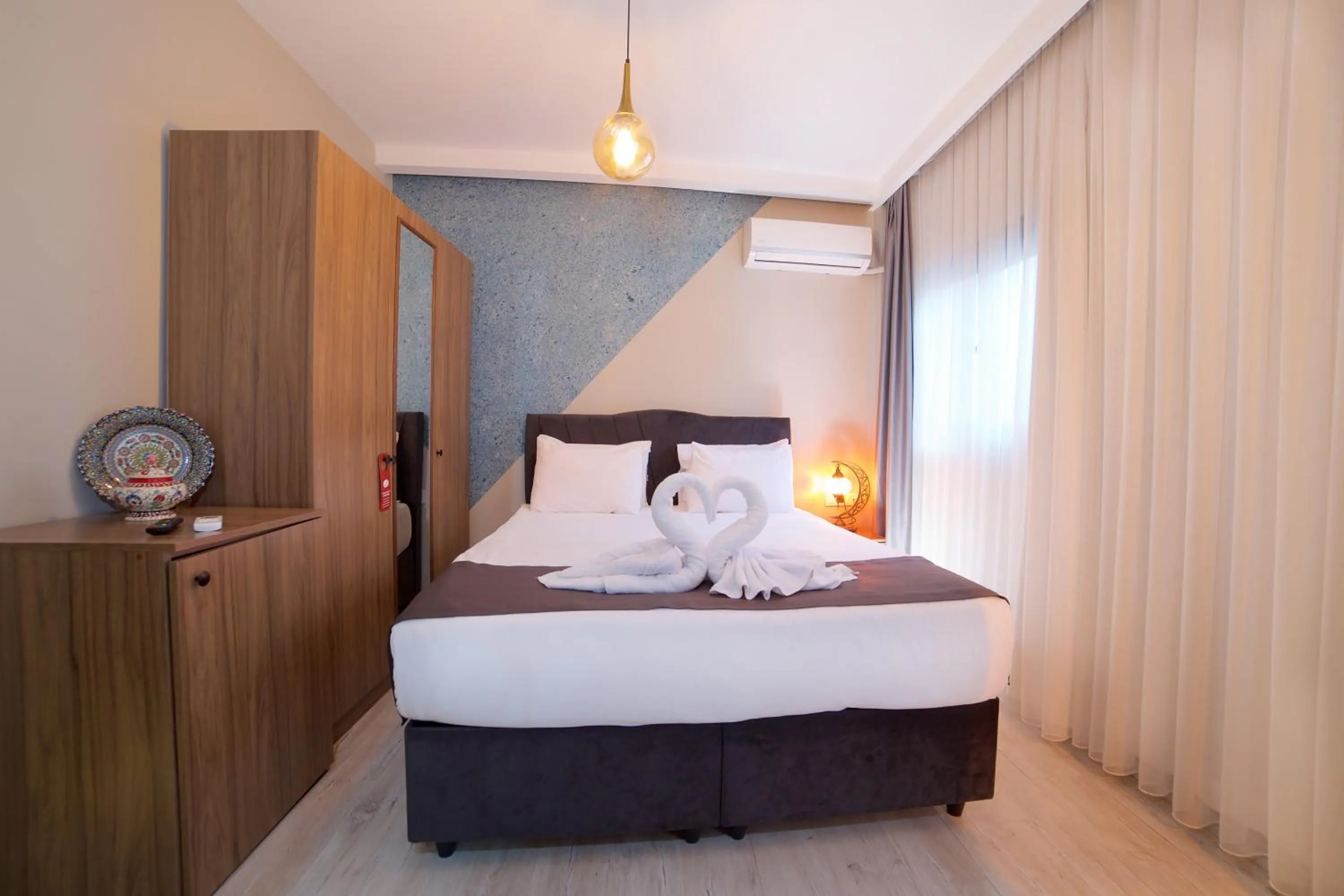 Bed in La Vida Old City Hotel