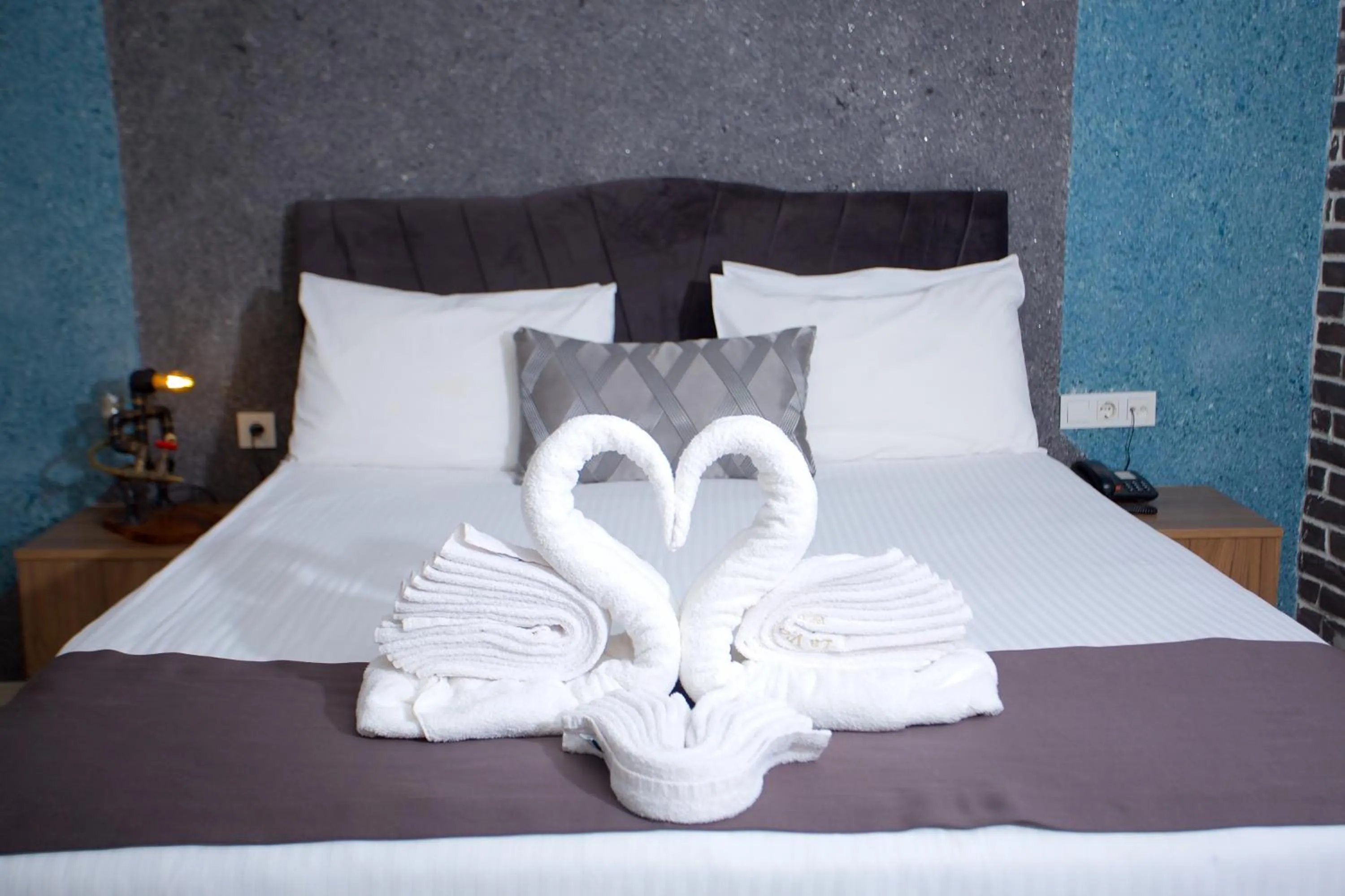 Bed in La Vida Old City Hotel