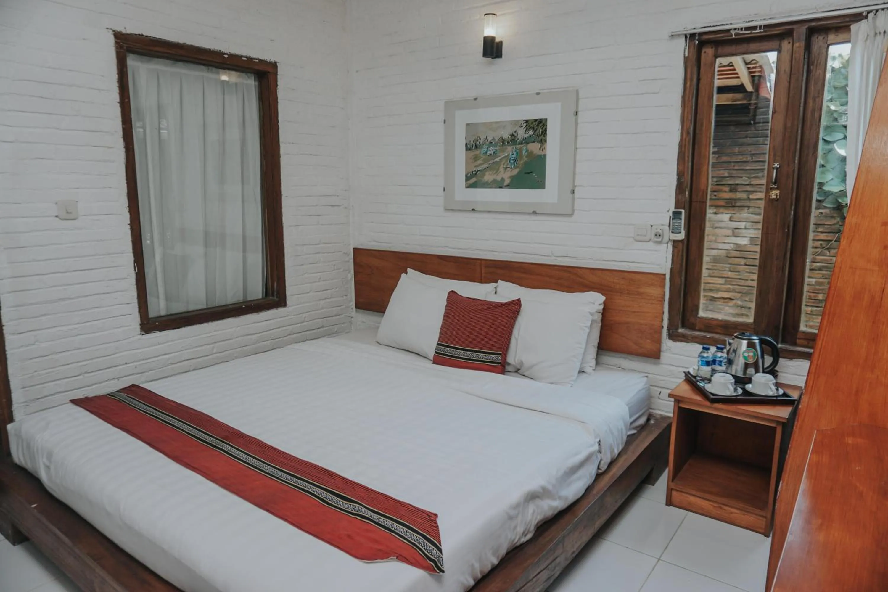 Bed in Cempaka Borobudur Guest House