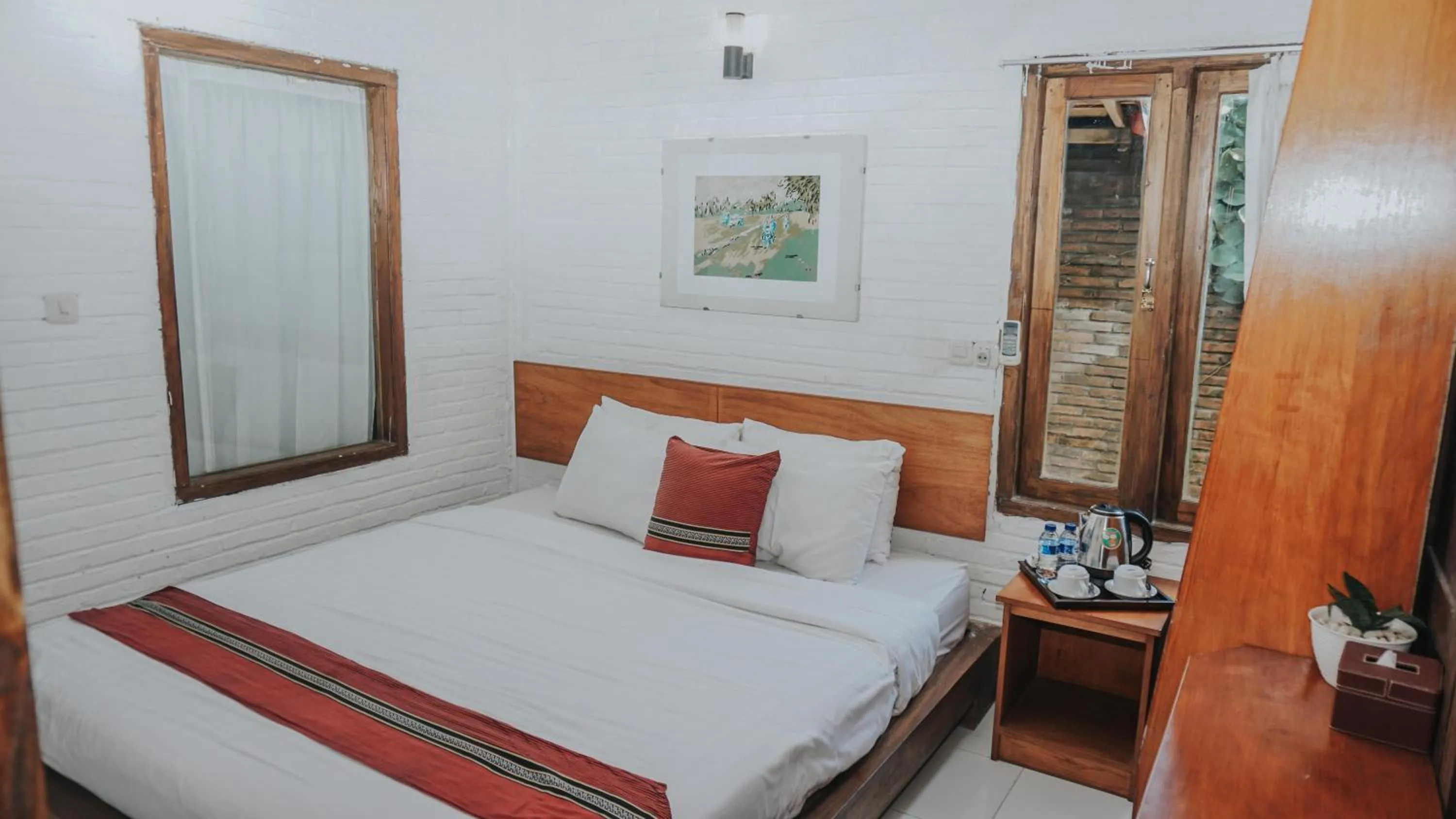 Bed in Cempaka Borobudur Guest House