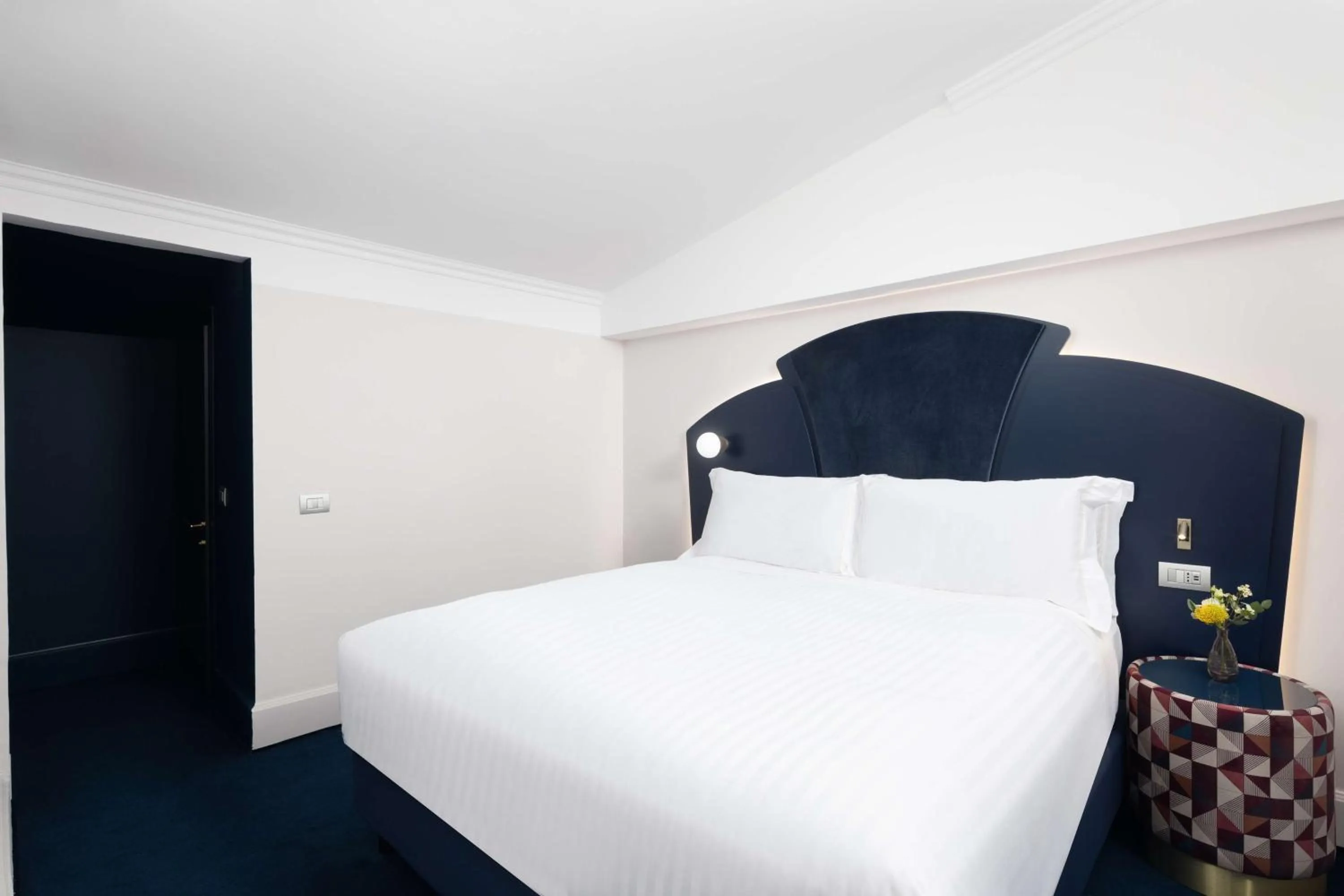 Bed in Anglo American Hotel Florence, Curio Collection By Hilton