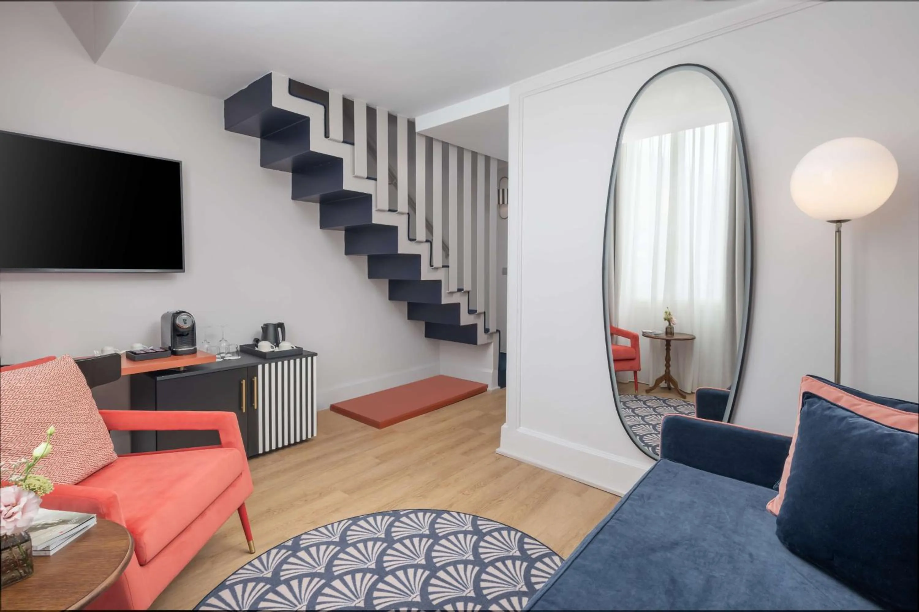 Living room in Anglo American Hotel Florence, Curio Collection By Hilton