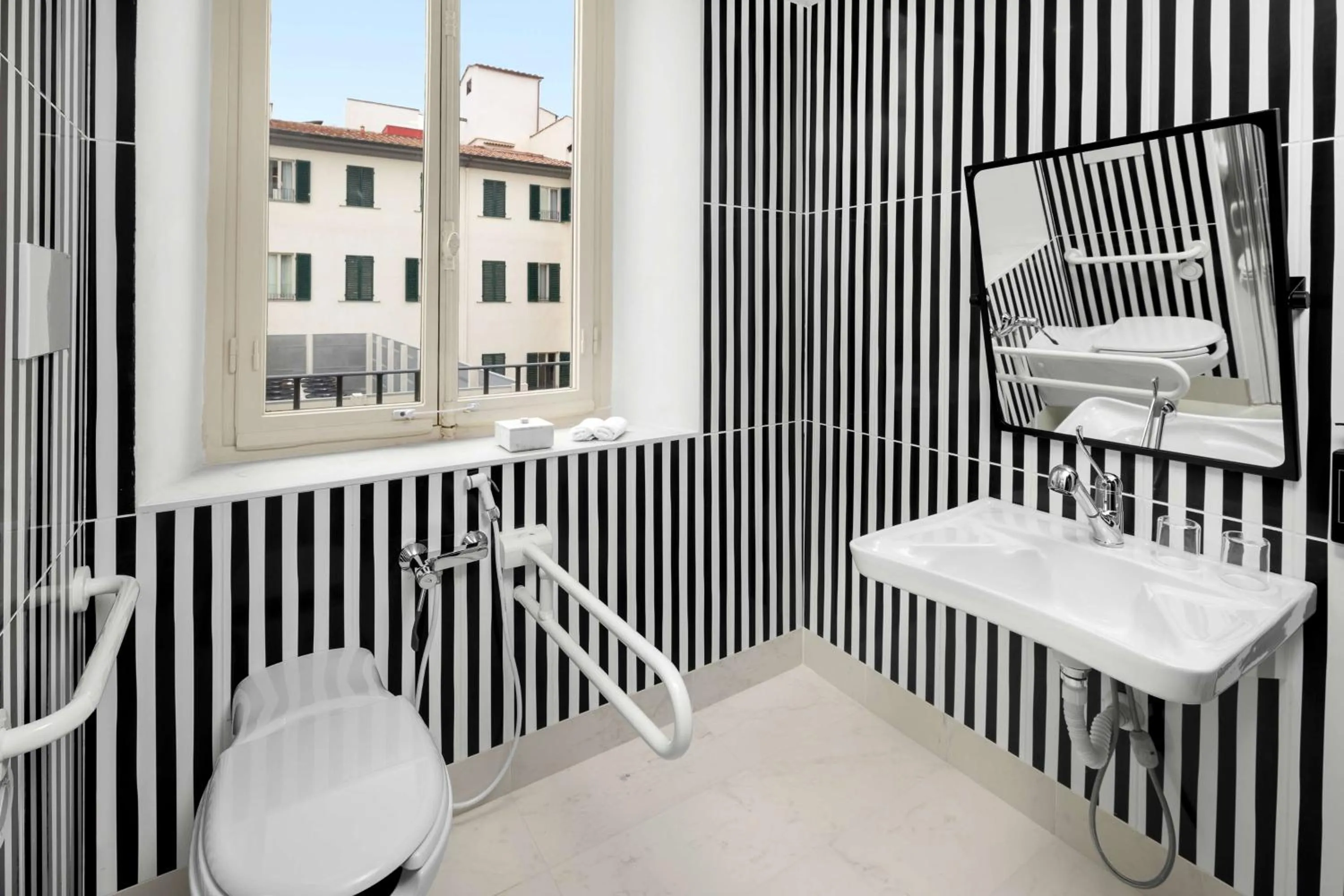 Bathroom in Anglo American Hotel Florence, Curio Collection By Hilton