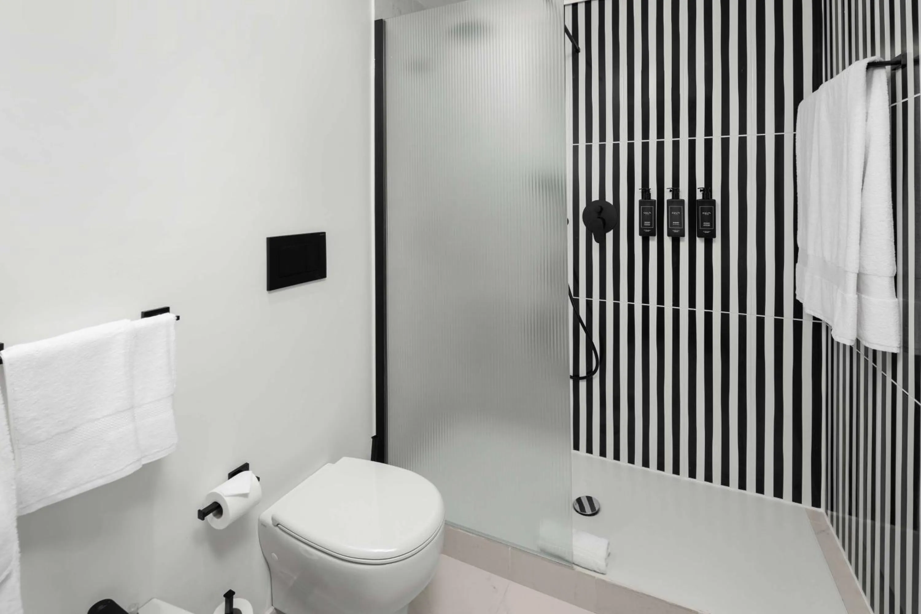 Bathroom in Anglo American Hotel Florence, Curio Collection By Hilton