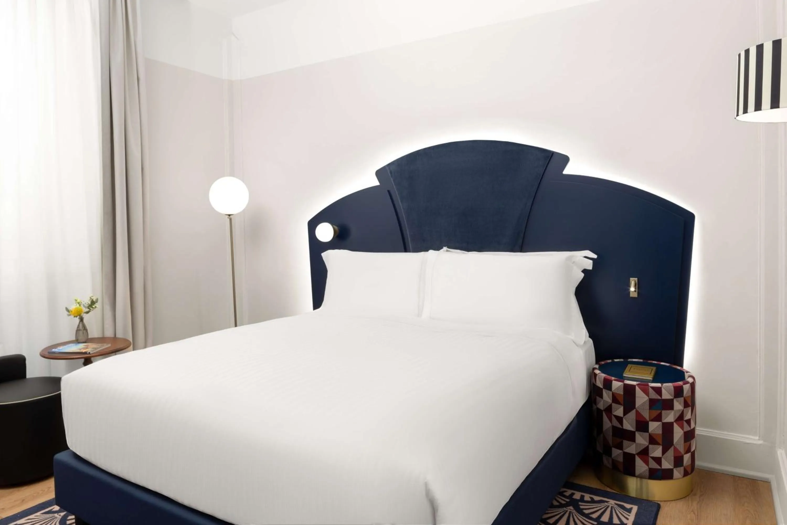 Bed in Anglo American Hotel Florence, Curio Collection By Hilton